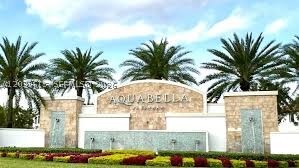 Highly desirable corner unit in the highly desirable community of AQUABELLA. Besides not having a neighbor to one side, this is also one of a few with No back neighbor for added privacy. This well -maintained unit features a flowing open concept from the front to the back, featuring a modern kitchen with quartz counters, stainless steel appliances and light colored cabinets for a brighter look-featuring a stool height snack counter. Downstairs, you also have a half-bath for visitors/company, plus double doors leading to the fenced back yard. Upstairs you have 3 bedrooms including the large master with spacious walk-in closet plus 2 more bedrooms and the conveniently located laundry. 
Other features include a 1-CAR GARAGE and additional space for 2 more cars.
Aquabella is a full amenity resort-style community that includes 24-hour guard-gated entrance, pools, kids play area and splash pool, 2 club houses, walking paths and state-of-the-art fitness center. There is easy access from major expressways and it is conveniently close to all types of shopping.