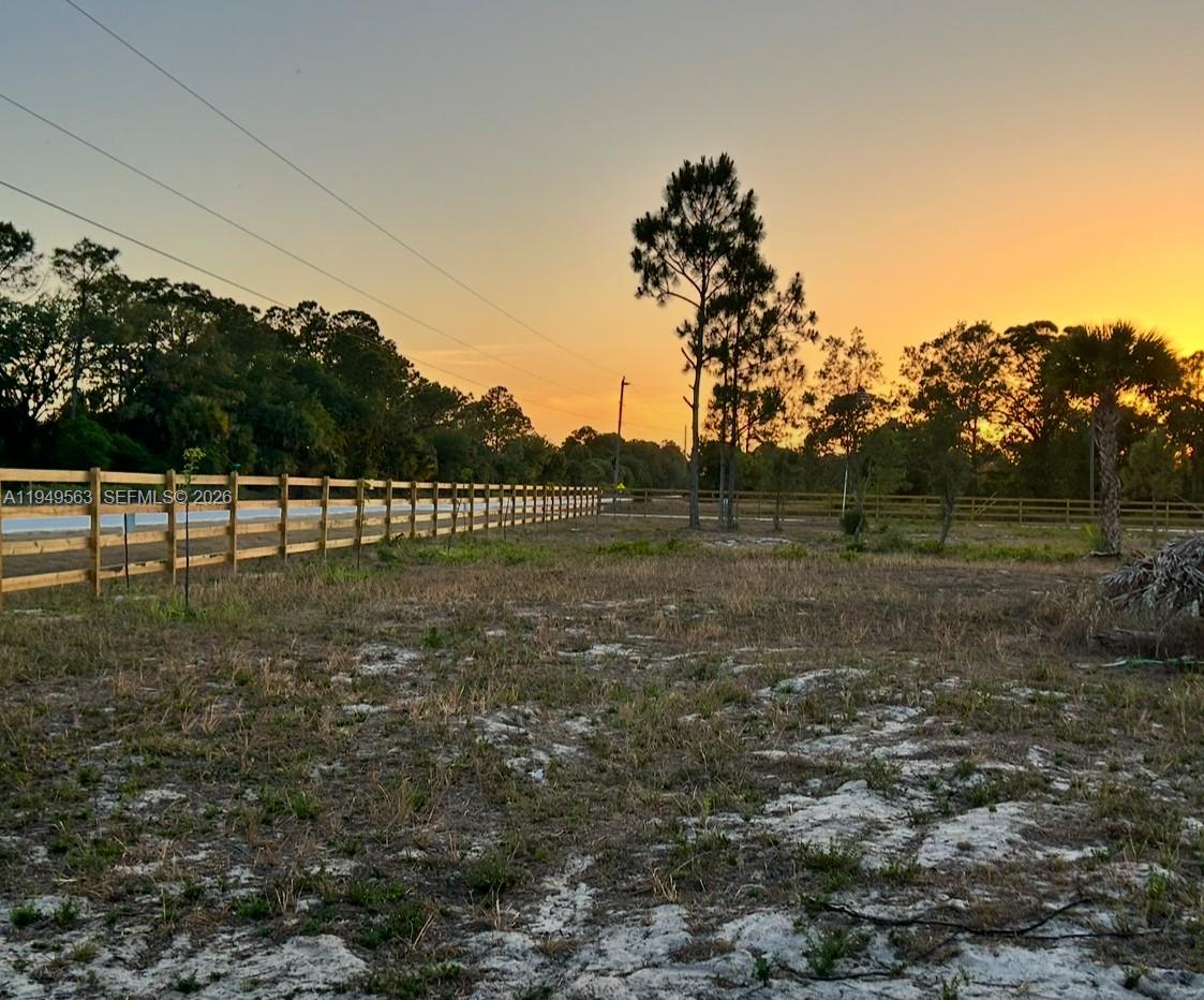 Bring your dreams to life away from the city noise and absolute tranquility surrounded by nature and clean air. Great investment opportunity or simply a weekend getaway from your daily routine.
Built your dream house on site and relax of South Florida weather. Easy access from any of Florida east and west coasts. This 1.25-acre lot in Montura Ranches is dry and high, waiting for your next adventure.
Newly installed wood fence in front of property, newly installed culvert, entire lot is currently clear; all improvements are legally permitted by county authorities. Community offers a Clubhouse featuring a swimming pool, recreation facilities, parks, playground, and basketball courts. NO Homeowners Association Fees.