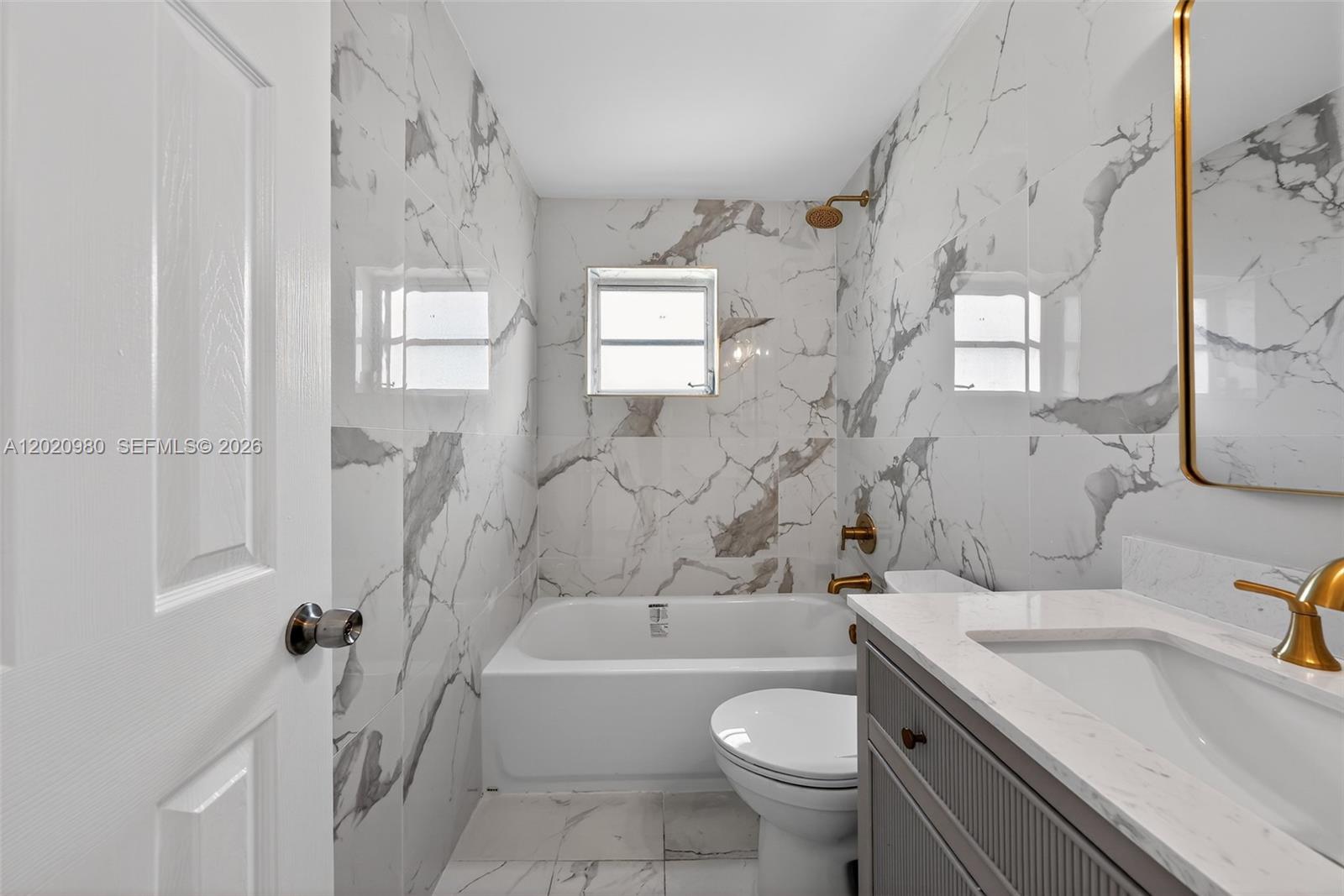 Beautifully maintained 2-bedroom, 1-bath condo located in the heart of Miami at Flagler Plaza Condo. This bright and spacious unit features an open-concept layout with abundant natural light, laminate tile flooring, and a functional kitchen with ample cabinet and counter space. The beautifully remodeled bathroom is a standout feature, showcasing elegant marble-look finishes throughout that create a modern and luxurious feel. Both bedrooms are generously sized, offering comfort and versatility. The community is gated and all-ages, featuring security cameras, a swimming pool, assigned parking, and on-site laundry facilities. Conveniently located near Coral Gables, Calle Ocho, Downtown Miami, Miami International Airport, major highways, shopping, dining, and public transportation. Excellent opportunity for homeowners or investors seeking a centrally located property in a highly desirable area. Move-in ready and easy to show!