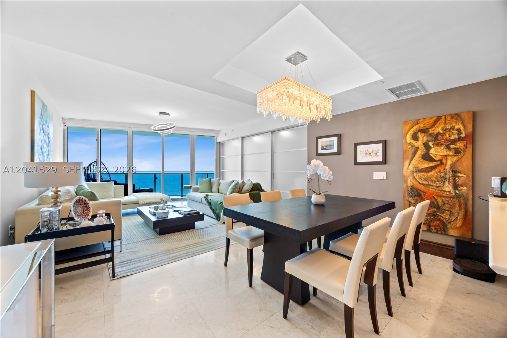 Experience exceptional oceanfront living from this stunning high-floor residence at Jade Beach. Residence 3005 offers 3 bedrooms, 3.5 bathrooms, and nearly 2,000 square feet of beautifully appointed living space with breathtaking panoramic views of the Atlantic Ocean, Intracoastal Waterway, and city skyline.

A private elevator foyer opens to elegant interiors featuring marble floors, floor-to-ceiling glass, and expansive living areas designed to maximize natural light and showcase the spectacular views. Two oversized terraces provide the perfect setting for outdoor dining, entertaining, or simply enjoying the sunrise over the ocean.

The spacious primary suite features direct ocean views, terrace access, a generous walk-in closet, and a luxurious spa-inspired bathroom. Two additional ensuite bedrooms provide comfort and privacy for family and guests.

This residence includes two assigned parking spaces conveniently located near the elevator.

Jade Beach offers a world-class lifestyle with resort-style amenities including oceanfront pools, beachfront service, spa, state-of-the-art fitness center, children's playroom, media room, resident lounge, valet, concierge, and 24-hour security.

Ideally located in the heart of Sunny Isles Beach, just minutes from Bal Harbour Shops, Aventura Mall, fine dining, and both Miami and Fort Lauderdale airports.