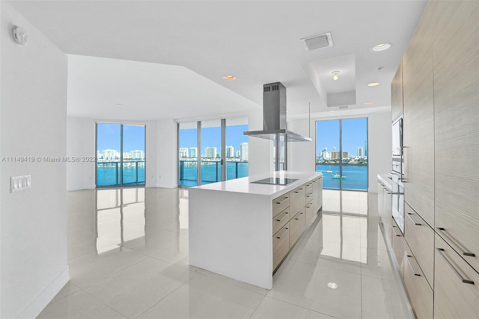 Beautifully finished corner unit. Premium finished with porcelain floors, Snaidero cabinetry in Kitchens and Baths, Wolf appliances, SubZero, and deluxe shades. Building has a large infinity edge pool, outdoor BBQ area, State of the art gym and spa w/steam room and sauna and private services. Club room with full kitchen, billiards, 100" TV, pilates , Business Center with conference , kids , teen , front desk and butler service. The building offers a 112-slip Marina to accommodate up to 100' yachts. Kayaks, paddle-boards and jet skis. Boat club membership also available. PAY ATTENTION ITS COMES WITH 02 GARAGE ASSIGNED PLUS STORAGE.

65 FOOT SLIP also available and for sell aside the unit. A rare opportunity to capture a desirable 65 FOOT PRIVATE SLIP FOR SALE.
