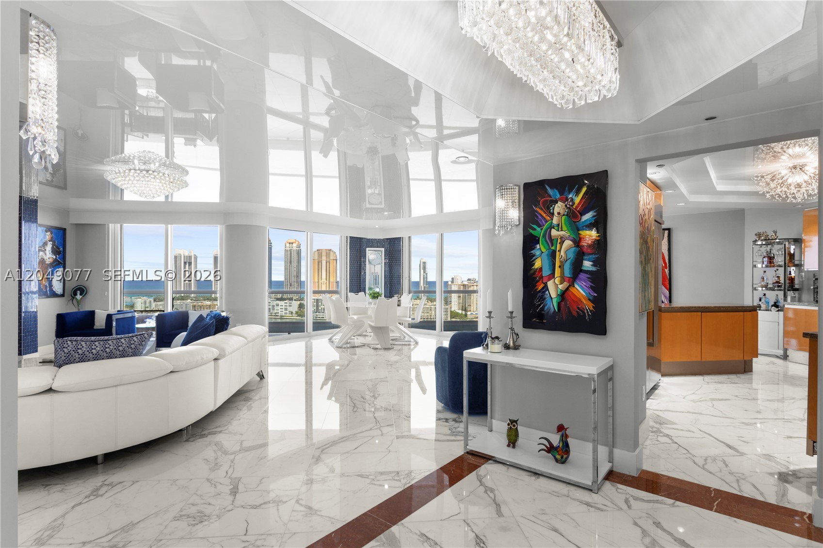 Experience luxury waterfront living at its finest in this beautifully appointed sky residence at Residence Du Cap on prestigious Williams Island. Offering approximately 2,800 SF, this expansive residence features a flexible 3-bedroom layout (the original second bedroom has been professionally divided to create a third bedroom), 3.5 bathrooms with sleek walk-in showers (no bathtubs), and a private elevator foyer. Floor-to-ceiling windows showcase breathtaking, unobstructed ocean and Intracoastal views from virtually every room, while reflective ceilings enhance the natural light and create a sophisticated ambiance. The thoughtfully designed split floor plan offers a spacious primary suite with a custom walk-in closet and spa-inspired bath, en-suite bathrooms for each bedroom, a gourmet kitchen with premium appliances, a guest powder room, and a full laundry room. Enjoy the unmatched lifestyle of Williams Island, featuring a 27,000 SF European-style spa, state-of-the-art fitness center, marina, tennis and pickleball courts, multiple restaurants, scenic walking paths, and an exclusive country club lifestyle just minutes from Aventura's finest shopping, dining, and beaches.