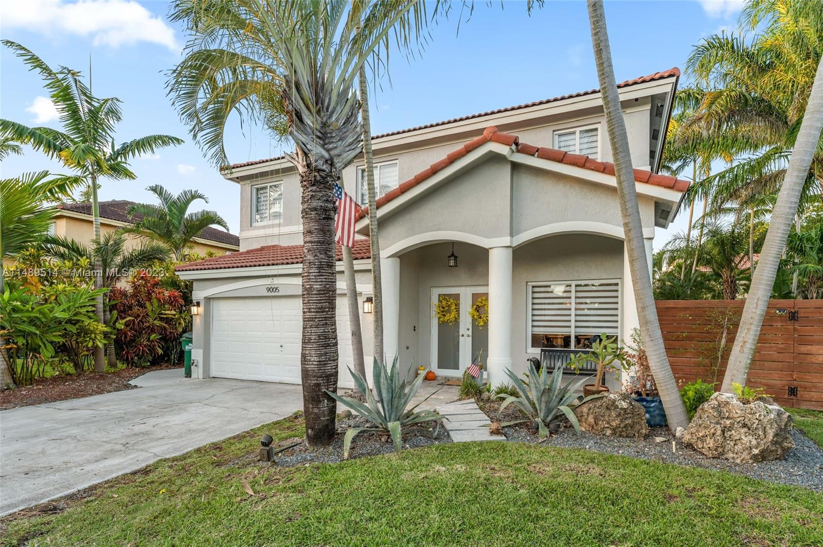 Beautiful TROPICAL OASIS waiting for it's next homeowners to come knocking. This exquisite 4 bedroom, 2.5 bath home is located amidst all the suburban necessities. The family friendly neighborhood is in walking distance to shopping and restaurants. The home has been professional landscaped with many types of exotic palms to indulge the next homeowner in the utmost of serenity and privacy. Beautiful screened porch and outdoor Jacuzzi. The split floor plan is designed to meet an ever evolving families needs and comforts. New Samsung washer and dryer, New Samsung refrigerator, New Dishwasher, New microwave. Two car garage. Spacious master bedroom with nook and master bath includes dual shower heads . Low quarterly HOA. Room for boat or RV. Contact listing agent to schedule a showing.
