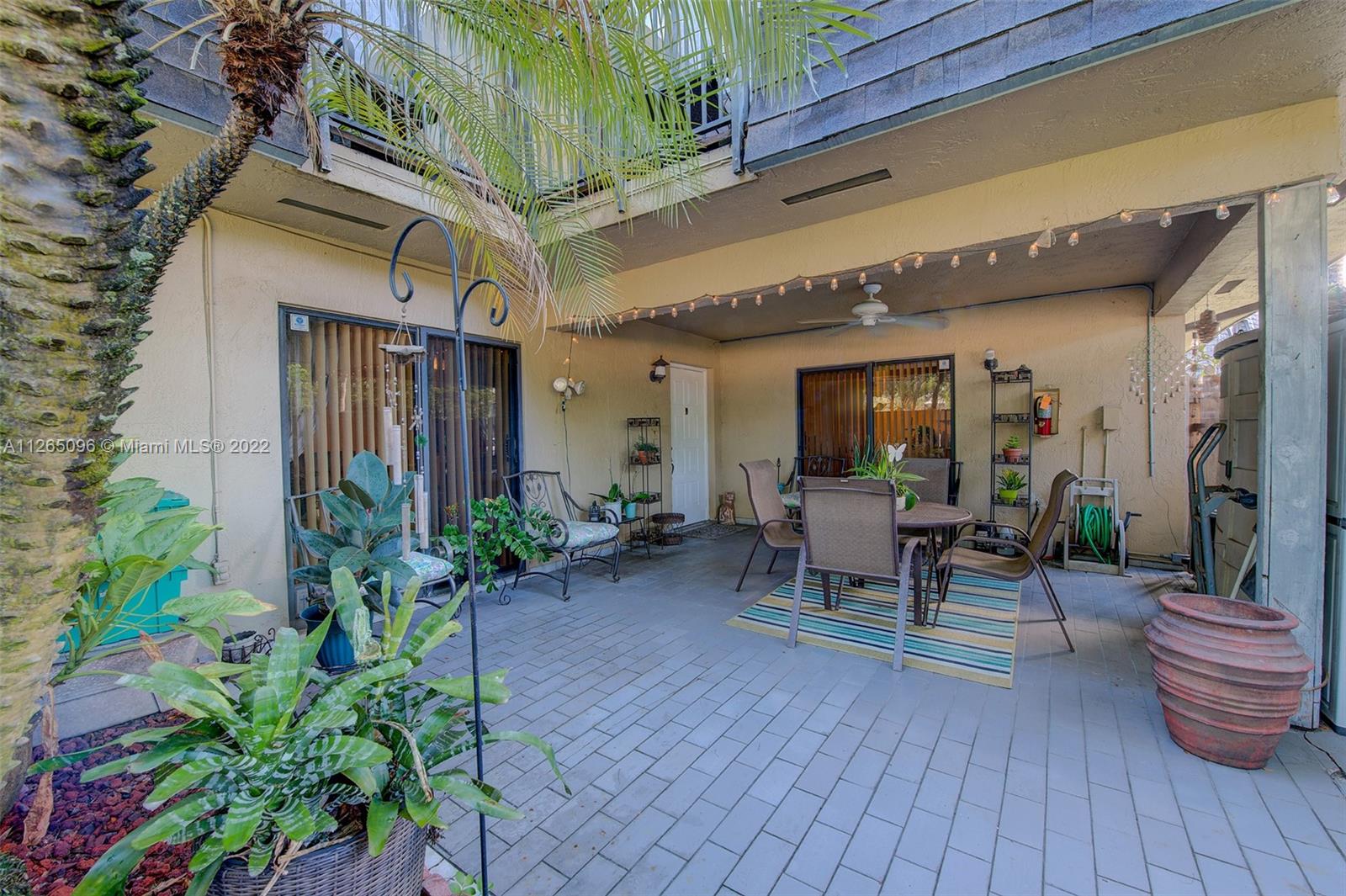 This property will sell fast! 3 bedroom and 2.5 bath condo, Original condition with new AC and water heater, tile floors all throughout the living area, bedrooms on the second floor and balcony. Fenced backyard with covered patio. Great area with excellent schools and shopping centers. A must see!
