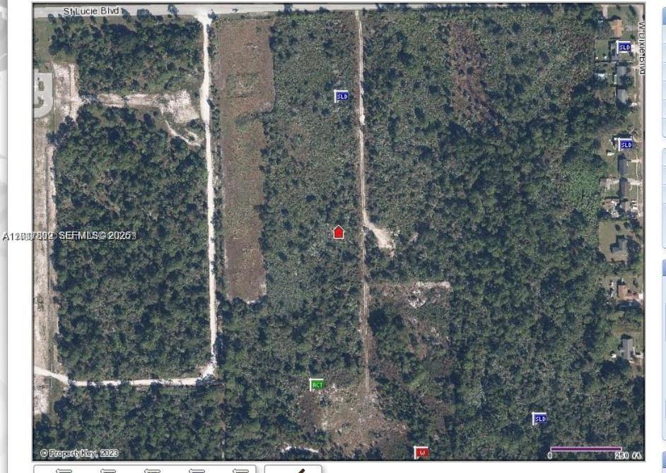 Find your slice of paradise on this beautiful & private home site lot and make your dream Home! It is conveniently located just minutes from King's Highway, Downtown, Farmers' Markets, Piers, and schools. With easy access to I-95 and plenty of shopping and restaurants on Okeechobee Road, this location offers convenience and accessibility. Less than a mile from US-1, providing easy access to Hutchinson Island