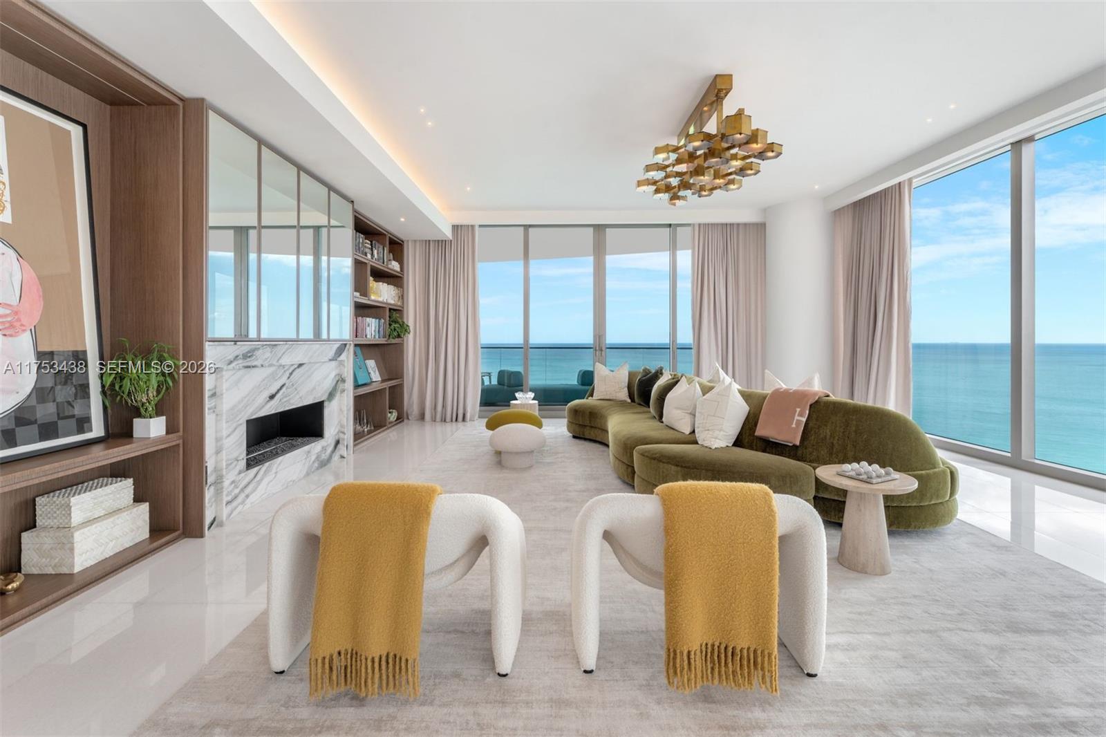 Experience unrivaled luxury at The Estates at Acqualina in this meticulously crafted 4-bed, 5.5-bath residence, offering breathtaking ocean & city views in Sunny Isles Beach. This sky-high sanctuary features a private elevator foyer, a chef’s kitchen w/ Wolf appliances, & a summer kitchen on the terrace. Significantly upgraded w/ top-level interior design, this rare 01-line layout offers more expansive living areas compared to the typical 5-bed configurations. The lavish primary suite boasts his-&-her baths & expansive custom walk-in closets, all framed by sweeping ocean vistas. Indulge in 45,000 SF of world-class amenities, including an ice-skating rink, bowling alley & resort-style pools. Just steps from the beach, embracing a vibrant and sophisticated oceanfront lifestyle.
