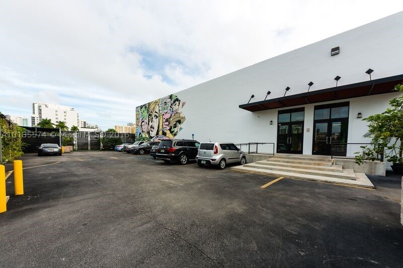 Exquisite spatial canvas for creative and industrial use located in the center of the highly sought after Wynwood district, home to Miami's cultural explosion, consisting of a large post industrial space flooded with natural light and expertly finished throughout. Cutting edge security system, three loading docks, and plenty of work and development space provide alternatives for the new owners. No sign on property