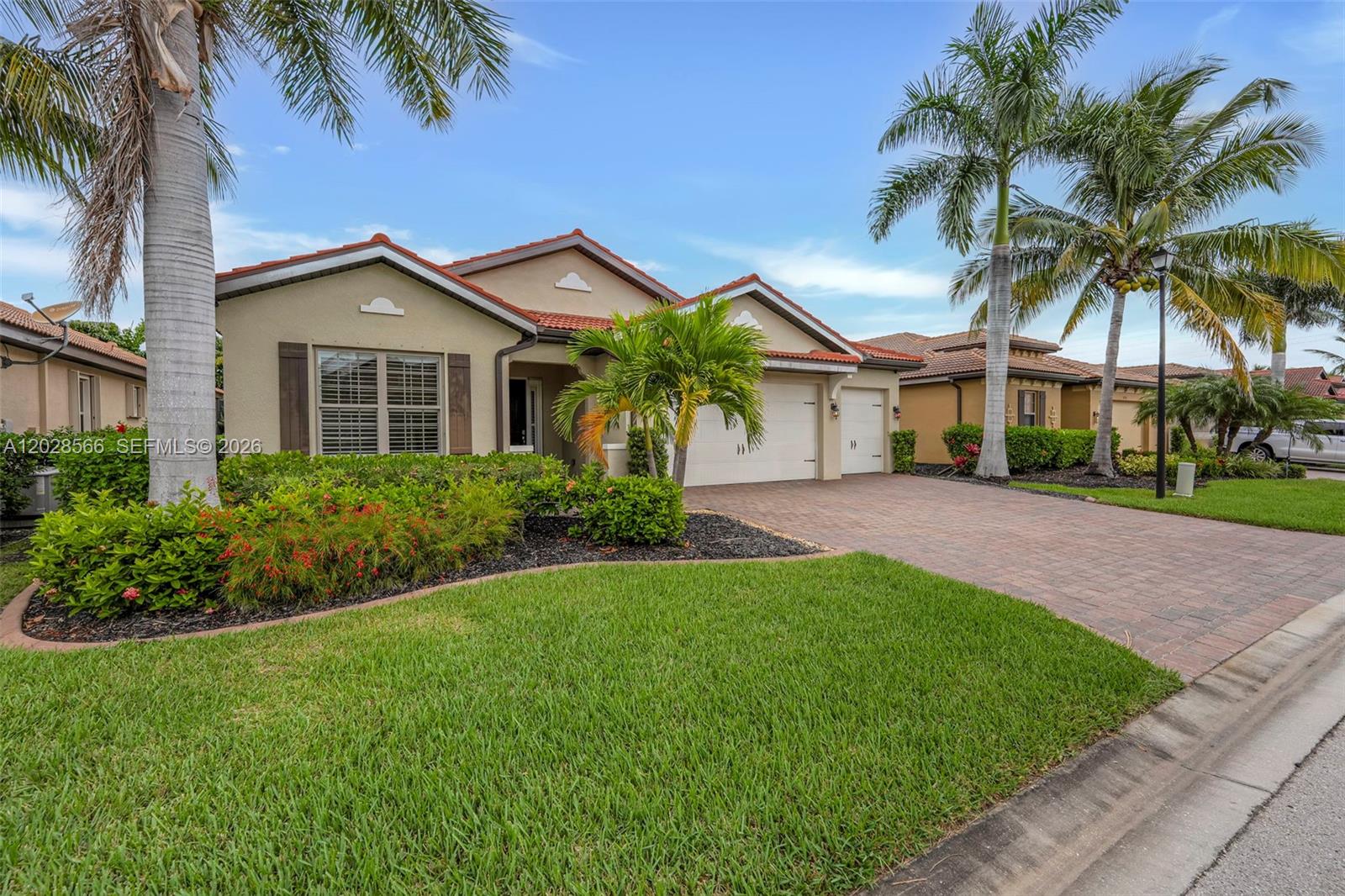 Discover the perfect blend of comfort and Florida charm in this beautifully maintained Fort Myers home featuring an open, light filled layout with spacious living areas and tasteful finishes throughout. The modern kitchen offers stainless steel appliances, sleek cabinetry, and a breakfast bar ideal for casual dining or entertaining. The primary suite provides a peaceful retreat with an en suite bath and generous closet space, while the additional bedrooms offer flexibility for guests, a home office, or growing needs. Step outside to the screened lanai overlooking lush greenery, creating the perfect space to relax and enjoy the Florida lifestyle year round. Located in a quiet, desirable community close to beaches, shopping, dining, and top rated schools, this home offers the best of Southwest Florida living.
