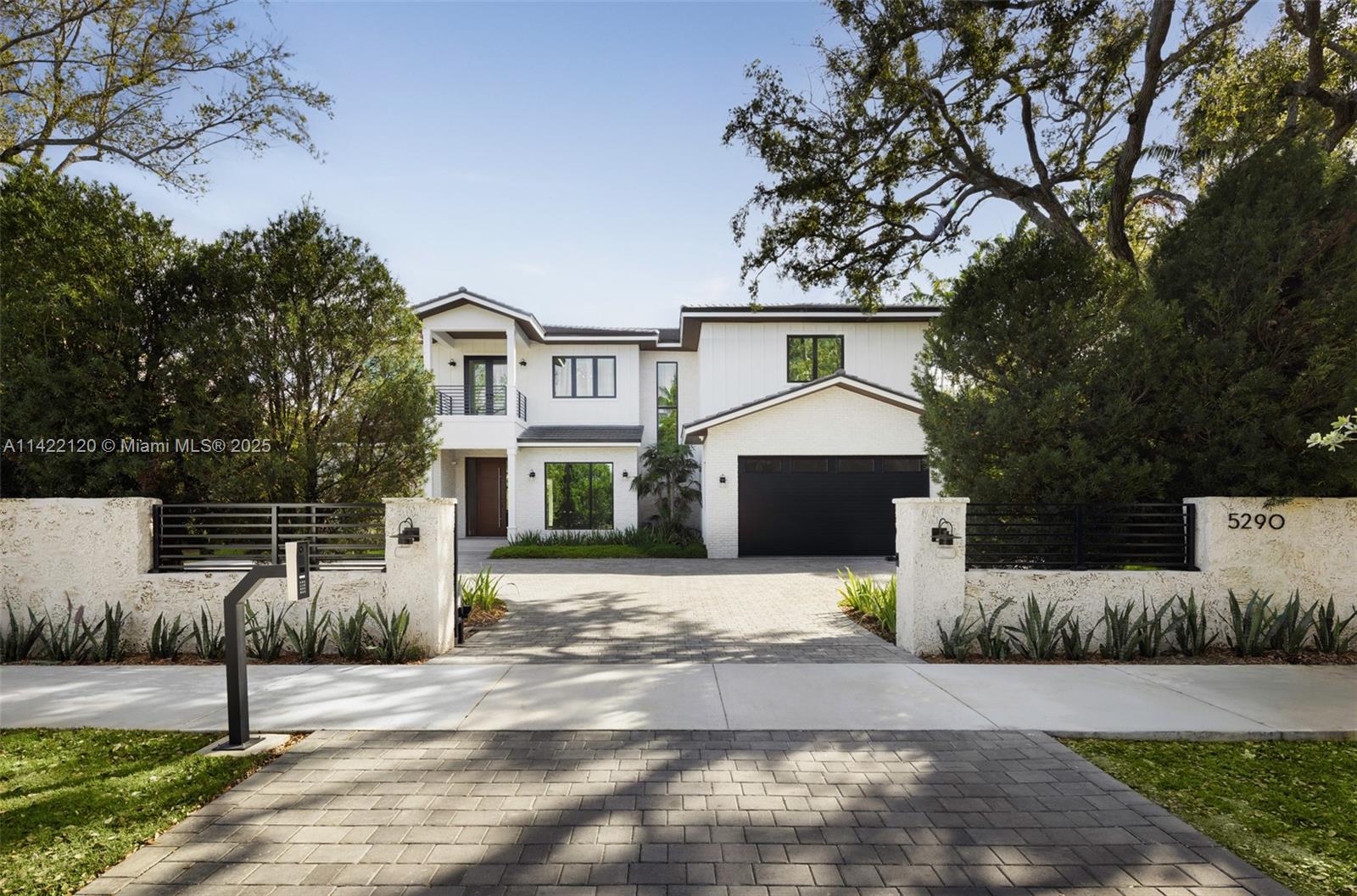 Behind a stunning privacy wall in idyllic Ponce Davis sits a dreamy 6 bed/7 bath Modern Farmhouse. Built by award -winning Hollub Group, this stunning turnkey home offers the perfect blend of contemporary luxury and charming elegance.You'll find comfort and tranquility in every corner of this home, with flex spaces, a luxurious primary suite, all ensuite bedrooms & great entertaining & living spaces,  highlighted by custom designs & finishes. High ceilings & natural light create an inviting atmosphere that seamlessly integrates the indoors w/ outdoors, overlooking the pool, summer kitchen & loggia. Thoughtfully curated custom gourmet kitchen with Sub-Zero & Wolf. This suburban retreat is an escape to a life of comfort, sophistication, & convenience. Elevator, generator. Available Q4/2024