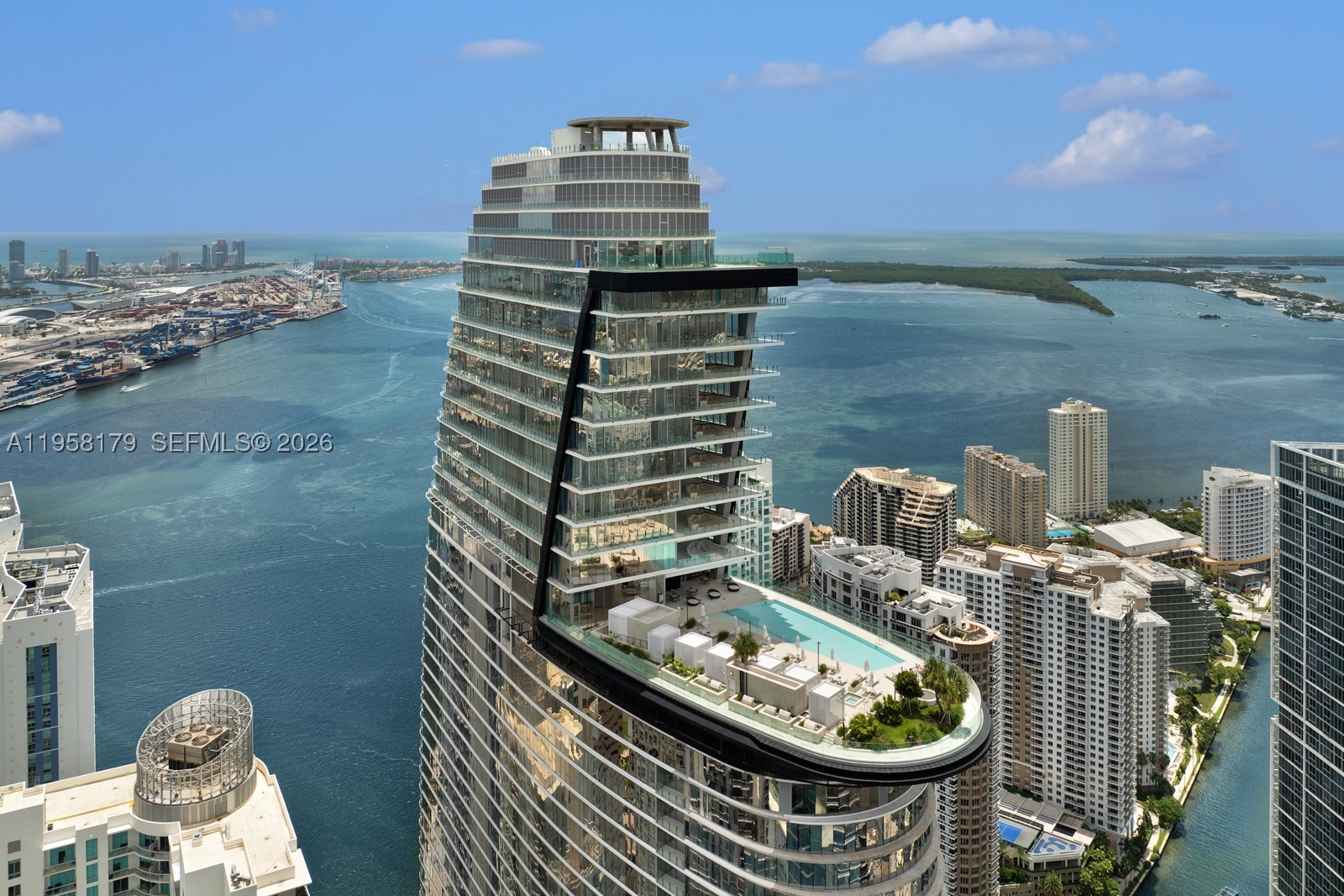 Fully furnished 4-bed, 4.5-bath with library at Aston Martin Residences with Poliform interiors and custom upgrades and accessories throughout. Private foyer entry into 3,643 int SF + 622 ext SF wraparound terrace. Floor-to-ceiling glass, marble flooring, and open bay and skyline views. Primary suite with spa-style soaking tub overlooking Biscayne Bay. Custom closet systems, shades and blinds, integrated sound system. Two parking spaces on same residence level. 42,000+ SF of amenities included. Blacklane chauffeur, beach service, private marina, infinity pool, spa, fitness center, lounges, and theaters.