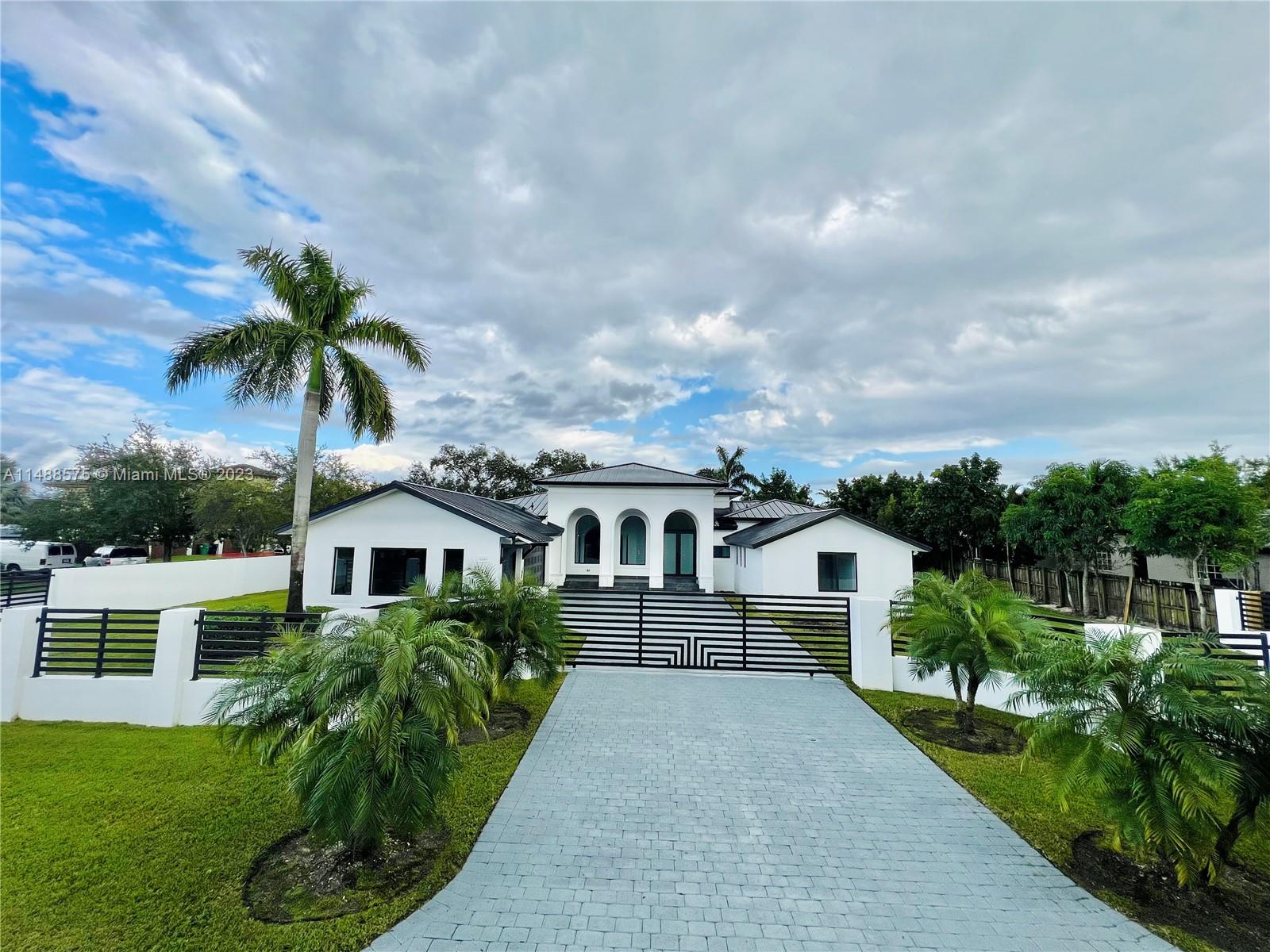 Welcome to see this Luxury House in Miami... Great LOCATION !!!! This Modern & Luxurious House is Located in RENAISSANCE RANCHES. Exclusive Custom Italian-Styled Kitchen, Modern Bathrooms & a beautiful 48x48 porcelain tile floor in the entire home. NEW METAL ROOF & FULL Impact Windows and Doors across the entire home. Corner LOT , surrounded by a solid fence with electronic gate entrance. Security Camera System, New lights, Fans etc. NO HOA. Pool Area fully renovated with Coral Stone deck and midnight-blue pool resurface. Open layout and almost 20ft high ceilings that you wont find nearby. A Move-In ready and big Miami Home ready for the most exigent buyers. Heated Pool with brand new equipment's. Owner Agent. This is a MOVE_IN Ready home,  built right with quality and modern upgrades.
