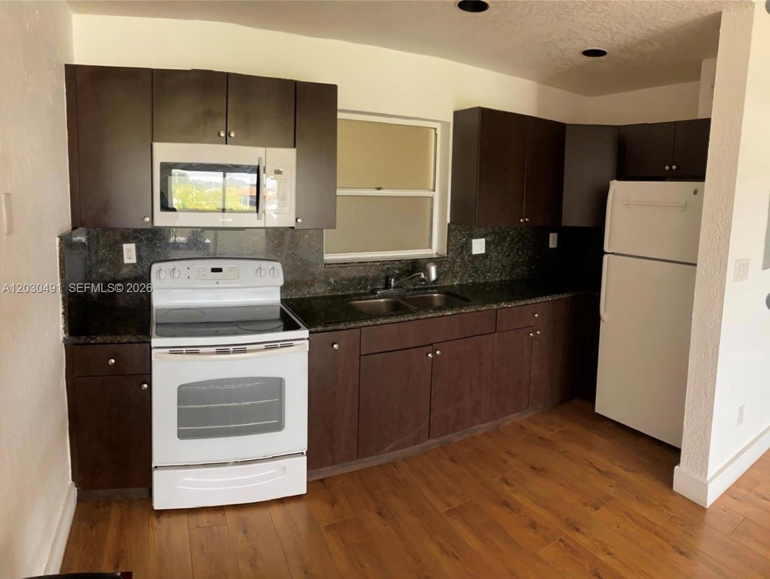 VILLAGE AT DADELAND CONDO - Residential