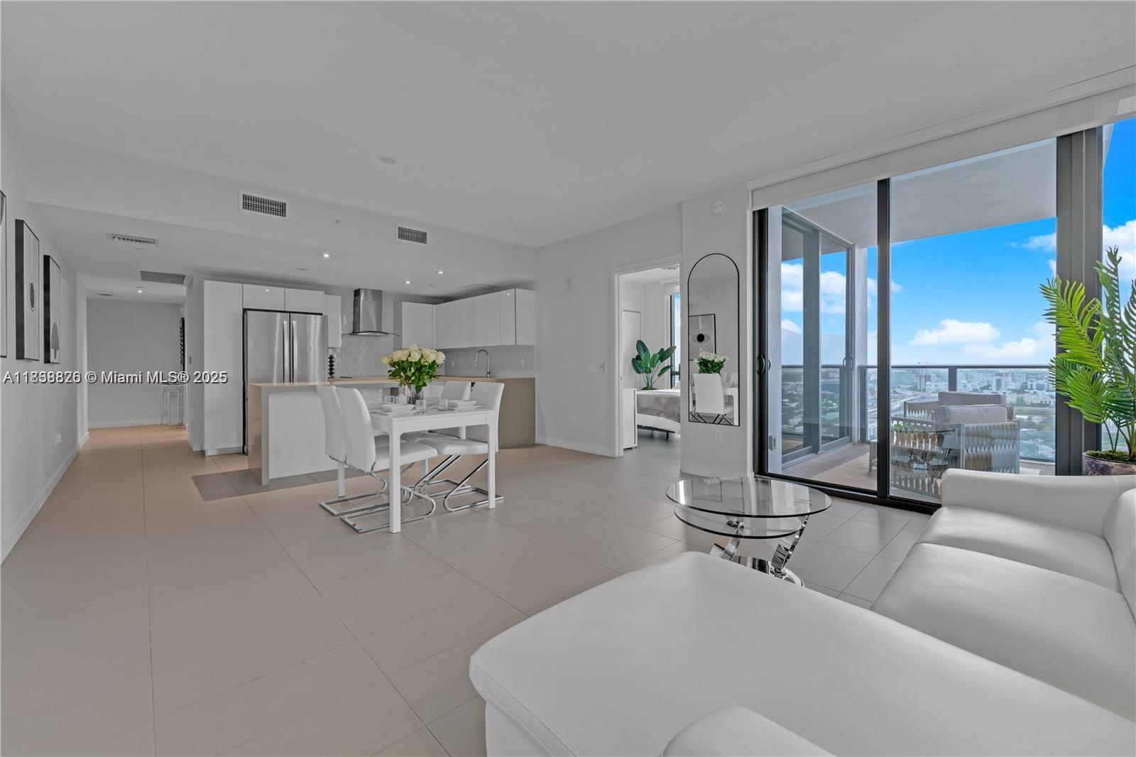 Experience urban elegance in this 2-bedroom, 2-bathroom condo with bathtubs, featuring floor-to-ceiling windows with power blinds and a highly efficient split floor plan. The open kitchen boasts top-of-the-line stainless steel appliances, bright European-style cabinetry with quartz countertops, plus a unique storage room on the same floor. Located minutes from Miami’s beaches, entertainment centers, major destinations, and the airport, this home includes 2 parking spots (1 valet, 1 self-parking) and utilities (internet, cable, water, trash). Enjoy three resort-style pools, a hot tub, gym, spa, cinema, racquetball, yoga studio, poker room, ping-pong, kids’ playroom, pet run, package lockers, 24/7 concierge, and optional paid storage.