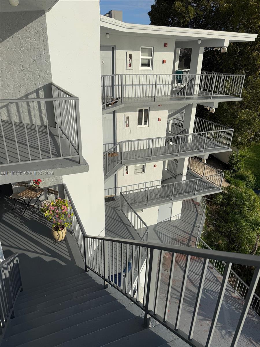 Ideally located in West Hialeah, just minutes from major highways, shopping centers, parks, and schools. This bright and well-maintained 2-bedroom, 1-bath condo features impact windows, an open-concept layout, stainless steel appliances, and a screened balcony perfect for relaxing or entertaining. The unit includes two assigned parking spaces, and the HOA covers water and insurance. Enjoy quick access to the Palmetto Expressway, Palmetto Hospital, and a variety of nearby dining options. A fantastic opportunity offering value, convenience, and location. No rental restrictions, making this an excellent option for investors or first-time buyers. Financing requires 25%down.  40 Years Recertification Issued on 2018 see MLS attachment. 2026 Approved Budget, Master Insurance and condo questionnaire available in the MLS Attachment.