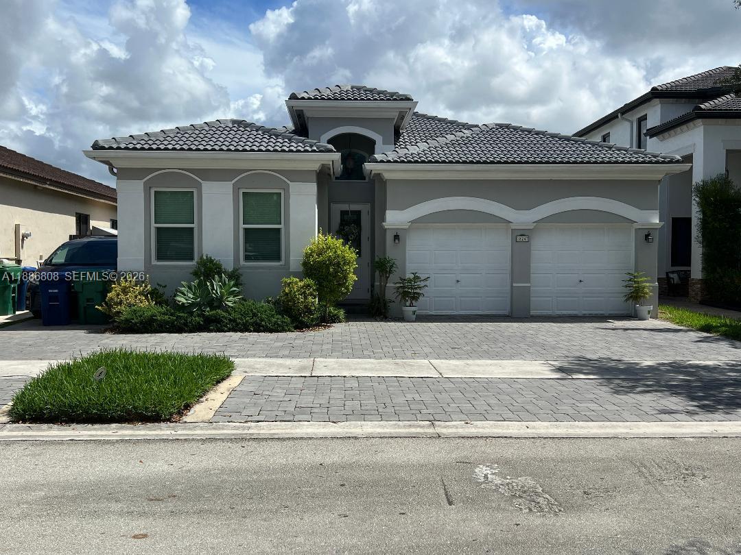 Beautifully updated 4 bed 3 bath home in one of Hialeah/Miami Lakes most desirable neighborhoods! Enjoy a rare sense of privacy with no neighbors directly in front of the property—just peaceful water views and open space. This move-in-ready home features a fully updated kitchen, renovated bathrooms, and a spacious layout perfect for everyday living. Covered terrace to enjoy the outdoors and big deck for more entertaining space.  Hurricane windows and doors throughout for peace of mind. Located on a quiet street and within walking distance to highly rated A-rated schools, this home offers the perfect combination of comfort, convenience, and location. Don't miss this opportunity to own a well-maintained home in a highly sought-after community.  Seller is open to offers.
