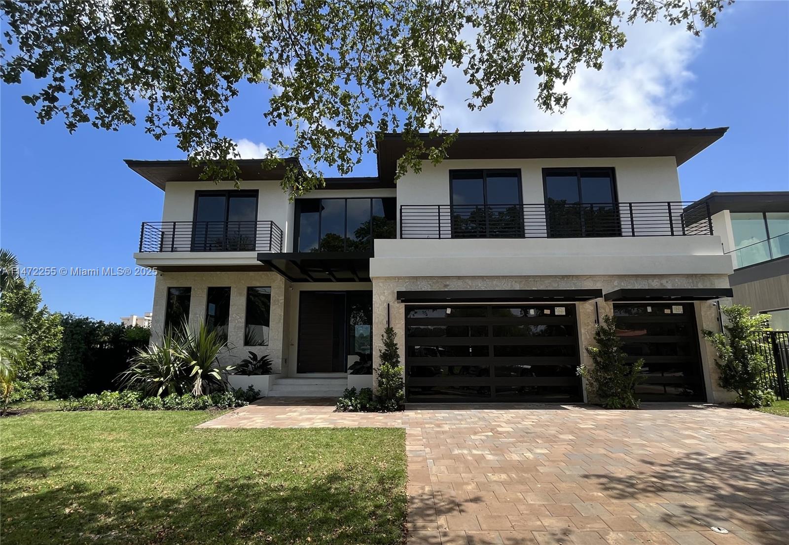 Want to be the lucky homeowner of this stunning contemporary waterfront masterpiece, ready for delivery next month. Dock your yacht in your backyard with no bridges to the bay & quick ocean access. Protected deep water dockage. Nestled on a quiet cul-de-sac in the exclusive gated Keystone Point community, this magnificently designed home features soaring double-volume ceilings, exquisite finishes, an expansive great room & grand entertaining spaces with meticulous attention to detail & nothing spared. Take the elevator to the primary suite with a steam shower, coffee bar, and an east-facing balcony for sunrise views. The sleek European kitchen boasts Sub-Zero, Wolf, & Bosch appliances. Enjoy an outdoor summer kitchen, a covered terrace, and a spa by the pool. Three-car garage included.