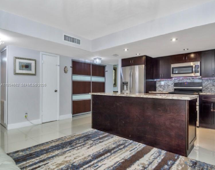 This is a beautifully remodeled apartment in the heart of Aventura. Conveniently located on the ground floor! It has it's parking spot right by the back door for direct entrance. This apartment has 4 bedrooms and 2 full bathrooms. Family and pet-friendly community/ two pools, kiddie pool, playground, gym, security patrol, BBQ area, clubhouse, sauna. In front of 3 miles of exercise path around the Golf Course, A+ SCHOOLS, AVENTURA MALL- Just 2 Blocks Away; BEACH- Just 5 min. 1 BLOCK: Aventura Mall, Target, Winn Dixie, Publix, Sinagogues, Walgreens, Kosher Kingdom and many other things and all walking distance.