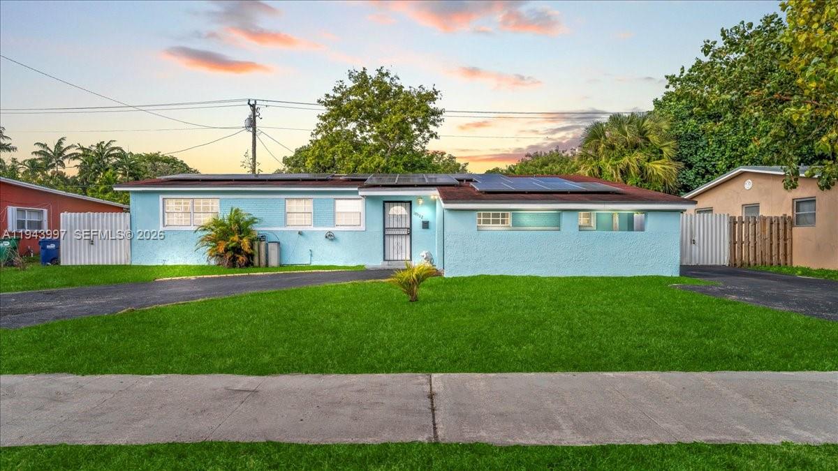 Beautifully remodeled 3-bedroom, 2-bath single-family home located in the desirable Miami Gardens, just minutes from Hard Rock Stadium, major highways, shopping, and dining. This move-in ready residence features an updated interior with modern finishes, spacious living areas, and a functional layout ideal for everyday living.
The property includes a separate storage/utility room located outside, perfect for additional storage or workspace. Solar panels throughout the home provide enhanced energy efficiency and lower utility costs.
Turn-key condition with recent upgrades—just bring your belongings and settle in. Convenient access to I-95, the Florida Turnpike, and local parks adds to the home’s appeal.