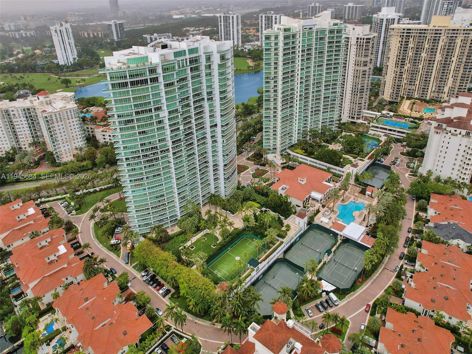 FIND YOUR PLACE IN THE PORTO VITA-SOUTH TOWER AND ENJOY THIS BEAUTIFUL CONDO, LOCATED AT THE MOST EXCLUSIVE AND LUXURIOUS IN AVENTURA. A FULL SERVICE BUILDING COMPLETE WITH A PRIVATE FULL-SERVICE COUNTRY CLUB WITH AN ARRAY OF AMENITIES. THIS IS A SPECTACULAR 2 BEDROOM PLUS DEN AND 3 1/2 BATHS WITH A COMPLETE PRIVACY WITH A RESIDENT/GUEST ONLY ELEVATOR LEADING TO YOUR PRIVATE FOYER THAT OPENS DIRECTLY INTO THE LIVING SPACE. INCREDIBLY CITY AND WATER VIEWS WITH EXPANSIVE BALCONIES OVERLOOKING THE FAIRMONT TURNBERRY GOLF COURSE AND MARINA. INCLUDES 2 ACCOMPANIED PARKING SPOTS AS WELL AS THE USE OF THE COMPLIMENTARY VALET FOR YOU AND YOUR GUESTS.