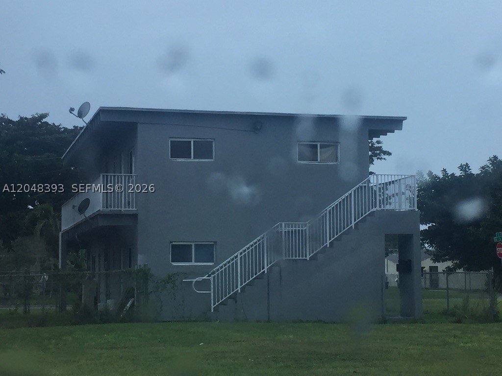 This 2 Story Fourplex provides an excellent residential income, Leased with Section 8 , each unit features 2 Bdrm 1 bth, and a family room, located in the growing Homestead Area. Please do not disturb tenants.