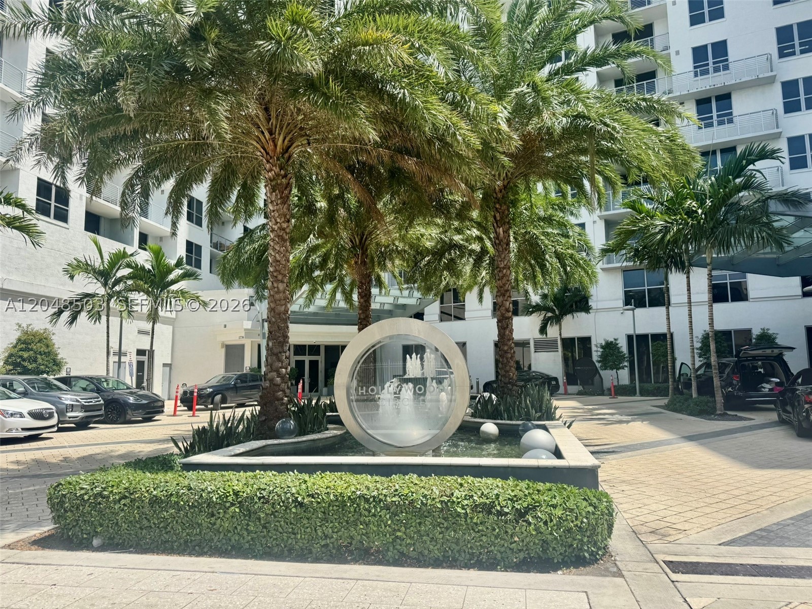 Downtown Hollywood 5 minutes from the beach, 1-bedroom, 1-bath residence offers open living space with tile flooring throughout, impact windows and doors, stainless steel appliances, in-unit washer/dryer, and a private balcony. Built in 2018, the unit includes an assigned parking space and access to outstanding rooftop amenities including a secured lobby, fitness center, BBQ/picnic area, community room, bicycle storage, and EV charging stations. Perfectly located across from Young Circle Park, Downstairs Publix Supermarket, Hollywood Beach Golf Club, Downtown Hollywood's restaurants, entertainment, arts district, and the famous Hollywood Beach Broadwalk. Ideal as a primary residence, vacation home, or investment property with exceptional rental flexibility—lease up to 12 times per year with a 30-day minimum.