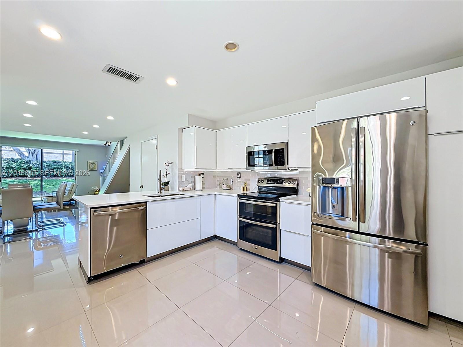 Beautifully remodeled 3-bedroom, 2.5-bath townhome in the highly sought-after city of Weston. This bright and airy home features a modern open layout, clean finishes, and an updated kitchen with white cabinetry and stainless steel appliances. Enjoy a spacious living area perfect for everyday living and entertaining. Located in a top-rated A school district, Weston is consistently ranked among the Top 3 Best Places to Live in Florida, known for its safety, low crime rate, and exceptional quality of life.