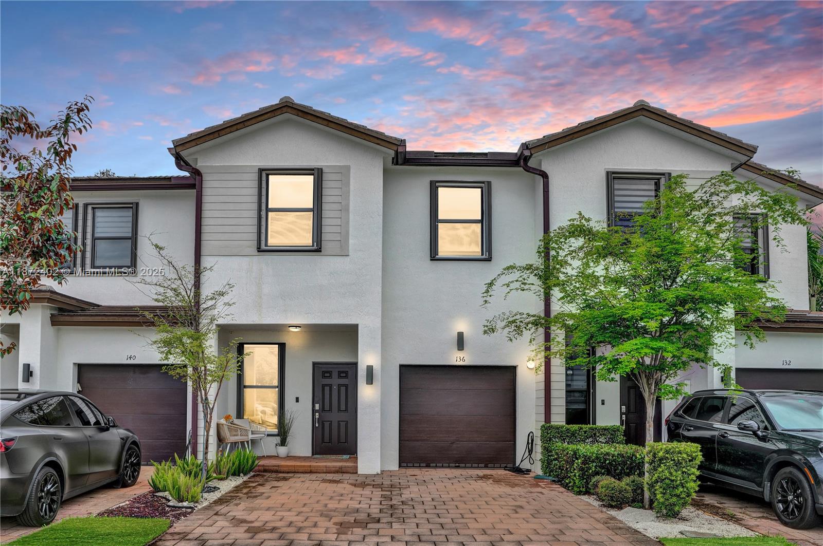 Built in 2020, this stunningly appointed 3 bed/2.5 bath + den townhouse is located in Tuscan Pines, Pembroke Pines, a private boutique community of only 58 homes with a pool. Home features 9ft ceilings, luxury vinyl plank flooring throughout, blackout shades in bedrooms, and stylish Zebra shades on the first floor. The spacious primary suite offers a tray ceiling, walk-in closet, and spa-like ensuite bath with dual sinks. Additional upgrades include a tankless water heater, AquaFeel home water filtration system + reverse osmosis in kitchen, accordion shutters, and a garage with storage. Enjoy a private fenced patio, perfect for relaxing or entertaining. Washer & dryer upstairs for convenience. Surrounded by A-rated schools and close to shopping, dining, Memorial Hospital & major highways