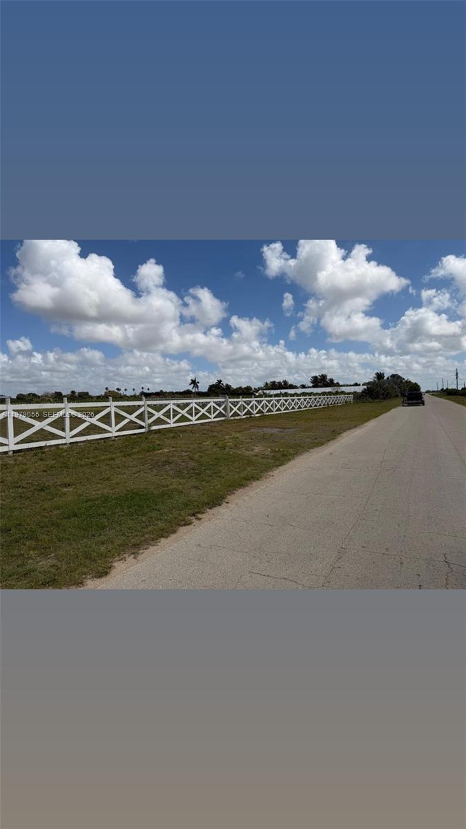 Exceptional opportunity for builders, investors, 2.62 acre buildable lot in a prestigious area surrounded by multi-million dollar homes. The property is fully fenced, cleared, and ready for development, with electricity and water already available. The generous lot size offers endless possibilities to design and build a custom luxury residence with room for expansive outdoor living, pool, guest house, or additional amenities Opportunities to acquire a lot of this size and readiness in such a desirable area are increasingly rare.