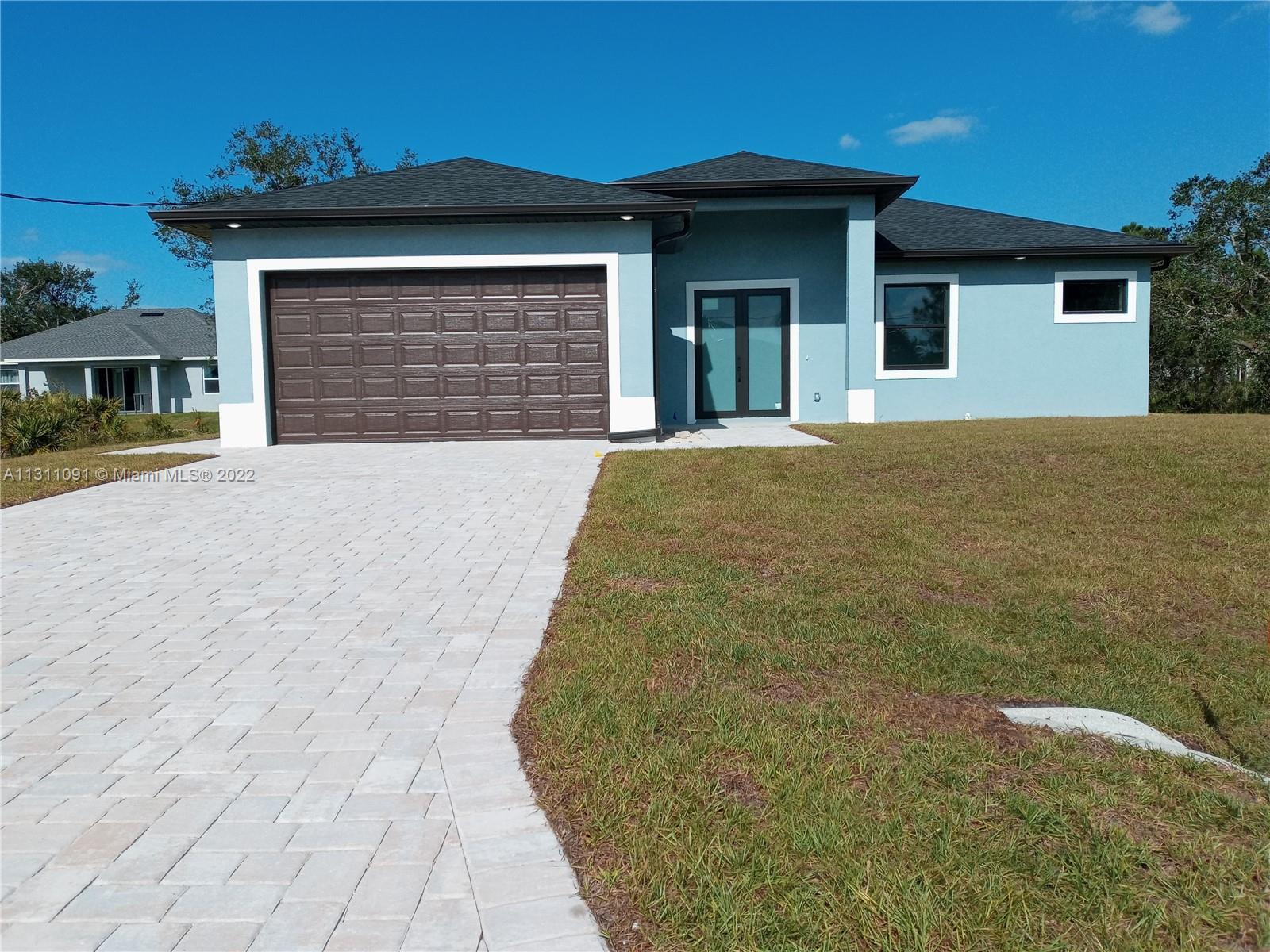NEW CONSTRUCTION This beautiful property is located in a growing area with schools and convenience stores nearby, easily accessible and with a lot of potential, ideal for families who want to live in a safe place. Some of the advantages of this beautiful house is that it has granite countertops in the kitchen, 42 wooden cabinets, all accessories are stainless steel, high ceilings including in the garage, led lights. The driveway floor is pavel. Some photos are for reference (garage).