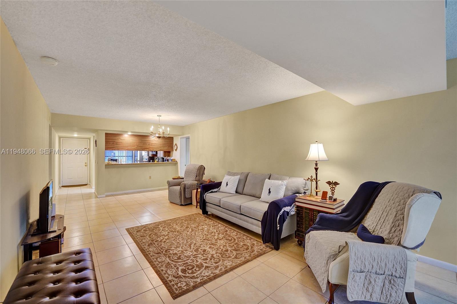 RARE INVESTMENT OPPORTUNITY IN PINE ISLAND RIDGE! Welcome to this immaculate 2-bedroom, 2-bathroom condo offering 1,385 sq ft of spacious, well-designed living in the private country club community of Pine Island Ridge Country Club—an all age community.  *****This unit is a true win-win for investors:  Buy and rent immediately—NO WAITING PERIOD!  Inside, enjoy an eat-in kitchen, an additional room ideal for a home office or flex space, and a full-size washer and dryer in the unit. The condo has been meticulously maintained and offers a comfortable, open layout perfect for everyday living.  Ideally located directly across the street from the community clubhouse and pool, residents enjoy resort-style amenities including a full fitness center, two restaurants, golf, tennis, pickleball, and a sparkling pool. Centrally located in Davie with easy access to major highways, shopping, dining, and top-rated schools.