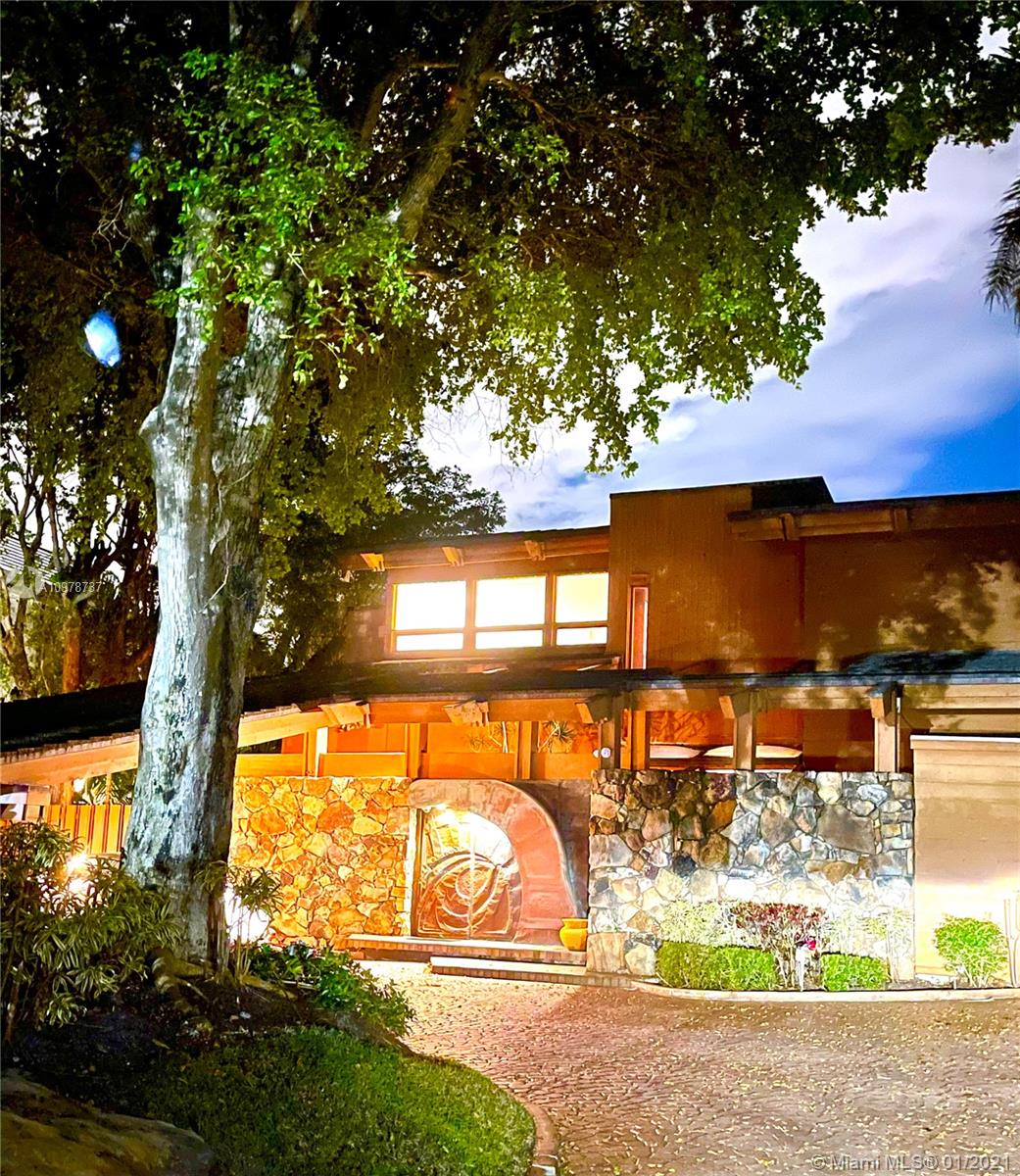 Prime sought after prestigious Bay Harbor Island estate on an amazing property! A Mid Century One of a kind California Style built in the late 1970s on a spacious lot of over 14,000 sf approximately 180 x 80 amazing wide bay view! Highest elevation seawall & 50ft dockage with elevator lift. Create your own masterpiece here....Renovate or build your dream estate...P Walking distance to the beach, and world famous Bal Harbour Shops, among  restaurants, Hotels and more all on Kane Concourse,  Also in Walking distance an A rated Ruth K Broad elementary school. Peace, privacy and tranquility.  Please contact the listing agent for more info.