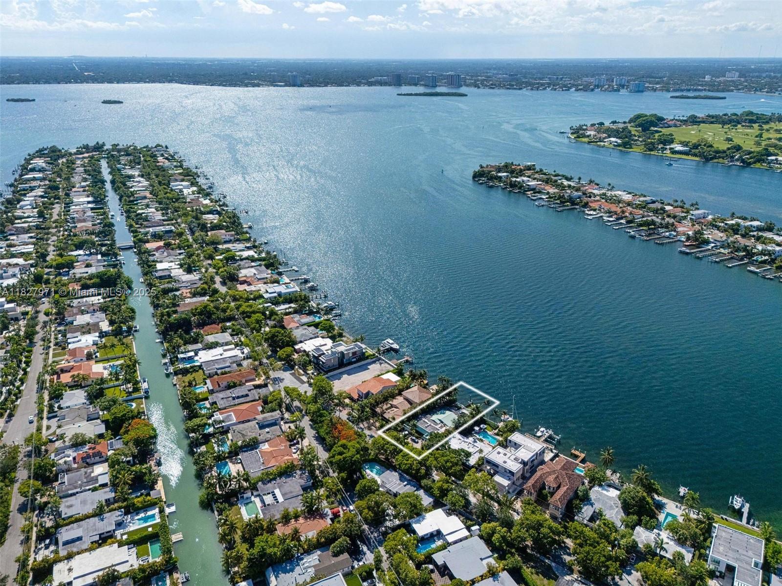 Incredible opportunity to acquire this waterfront property priced at lot value on one of Miami Beach’s most exclusive gated islands. This 4BD/3.5BA home, approx. 3,934 SF under AC, sits on an oversized lot with 75 feet of open bay frontage and spectacular views. Ideal for a full remodel or complete redevelopment for the construction of a brand new house (Floor plans of a stunning new contemporary home available upon request) —bring architectural vision to life with your own custom masterpiece in a booming area. Just minutes from Bal Harbour, world-class beaches, dining & shopping. Rare chance to secure prime bay-front real estate at land-only pricing. Easy to show.
