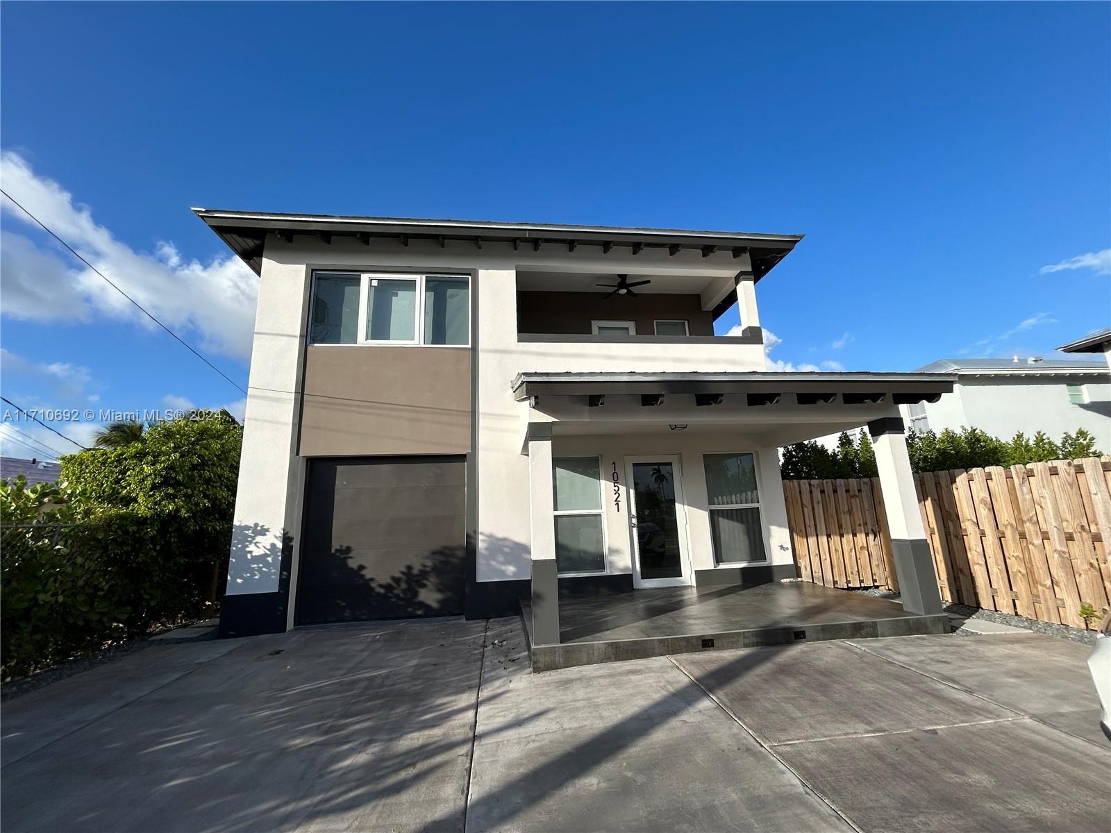 Discover this magnificent, newly constructed two-story residence featuring a sleek, contemporary design with high-quality finishes. The spacious and bright ground floor boasts an open-concept living and dining area, perfect for family gatherings and entertaining. The modern kitchen features a central island, state-of-the-art stainless steel appliances, and quartz countertops. Additional amenities include a convenient washer and dryer. Upstairs, you’ll find 4 spacious bedrooms and 2.5 bathrooms. Quality details, including impact-resistant doors and windows and recessed lighting, elevate the elegance of each space. Outdoor highlights include an inviting balcony for relaxation and a large backyard ideal for activities and social gatherings. The property also offers four parking