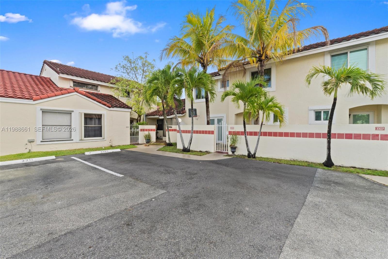 Welcome to this stunning townhome nestled in a serene location with captivating Waterview. This exquisite residence boasts three bedrooms and 2 and 1/2 updated bathrooms. The interior design seamlessly connects the living room, dining area, and kitchen, creating an ideal space for both relaxation and entertaining. Large impact sliding doors and windows adorn the walls, allowing abundant natural light to flood the interior. The kitchen features ample cabinetry and generous counter space. Beyond the interior, the outdoor space is equally captivating. Step outside onto the patio area and take in the breathtaking view of the water. With close proximity to many amenities and just 30 mins to the Fl Keys you don't want to miss out on the chance to make this extraordinary Waterview home your!