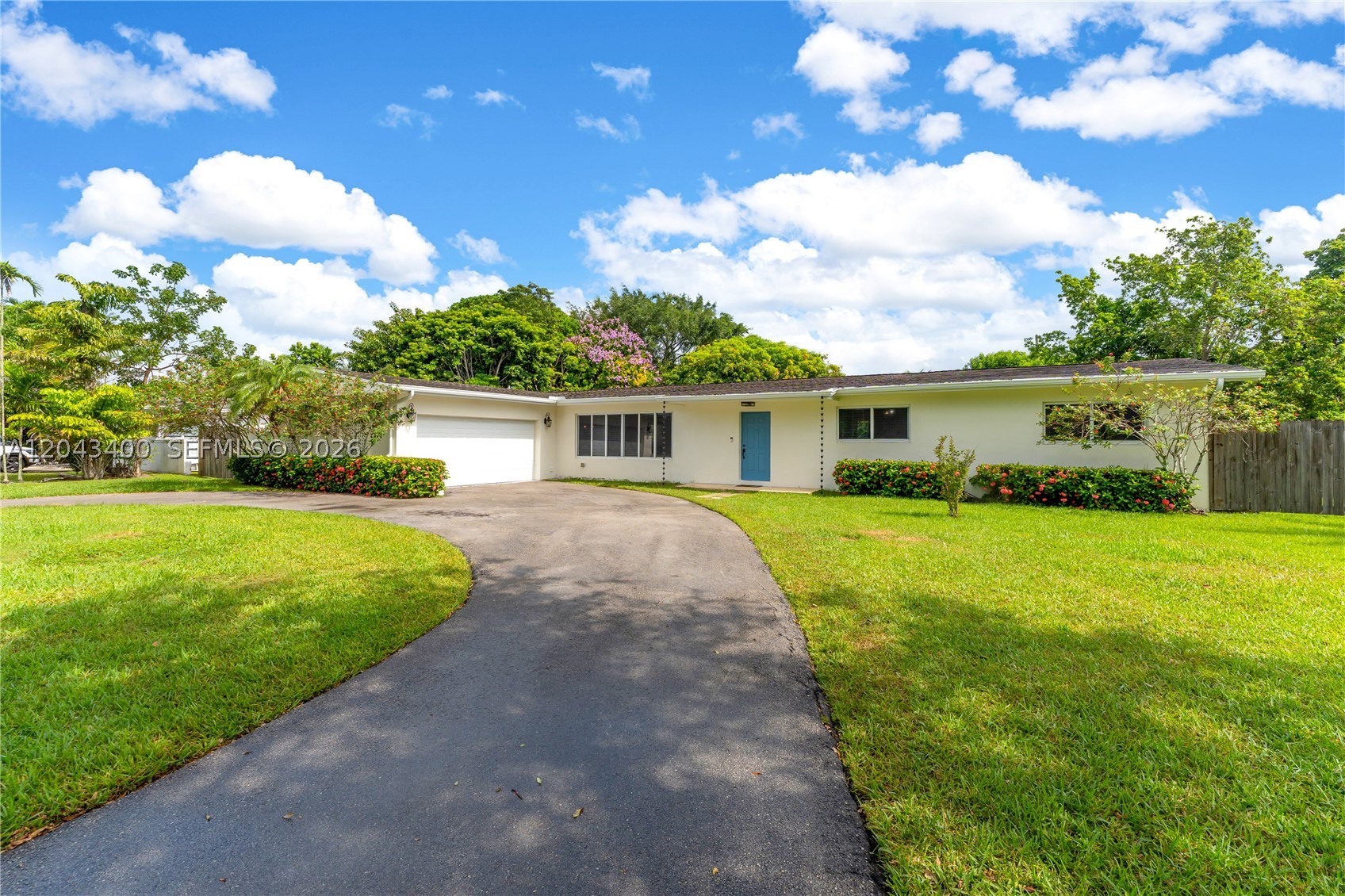 Beautifully updated in 2017, this 4-bedroom, 2-bathroom home sits on a nearly 16,000-square-foot lot in the heart of Pinecrest, one of Miami's most sought-after communities. The open, light-filled floor plan features a spacious primary suite with a private ensuite bathroom and walk-in closet, generous living areas, and a two-car garage. *The home's actual living area is larger than reflected on the tax roll, offering even more functional living space.* The expansive backyard provides ample room to add a pool, outdoor kitchen, or create your own private oasis. Conveniently located near top-rated schools, parks, shopping, and dining, this move-in-ready home offers an exceptional opportunity to enjoy the best of Pinecrest living.