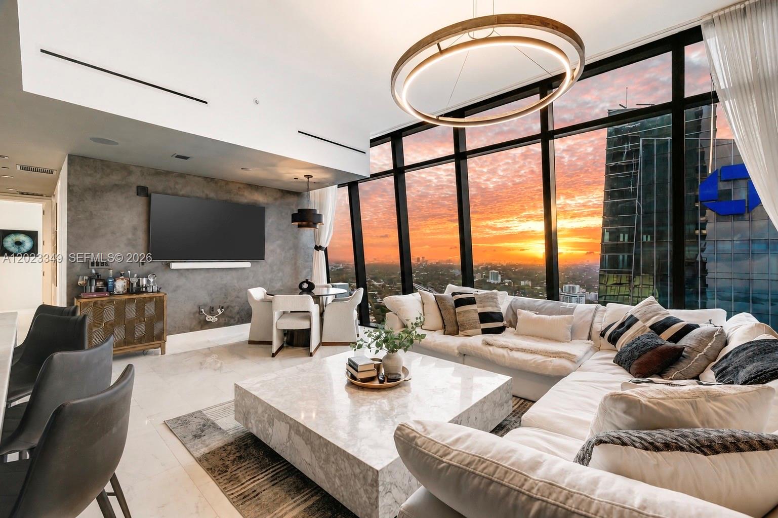 Welcome to Residence 4304 at Echo Brickell, a high-floor corner residence in one of Miami’s premier boutique luxury buildings. This 2-bedroom, 2.5-bath residence features soaring 12-foot ceilings and floor-to-ceiling impact windows that fill the home with natural light and showcase breathtaking Biscayne Bay, skyline, and sunset views.
Thoughtfully upgraded with custom wood paneling, electric blinds, Savant smart home integration, sonos surround throughout, and lutron lighting system. The kitchen is equipped with Sub-Zero and Wolf appliances, premium finishes, and custom cabinetry. Enjoy seamless indoor-outdoor living with a spacious terrace and summer kitchen overlooking the water. 
Echo Brickell offers resort-style amenities including an infinity-edge pool, fitness center, spa, 24-hour concierge, valet, security, complimentary chauffeur service, pet services, and more. Ideally located just steps from Brickell’s best dining, shopping, and nightlife, with easy access in and out of Brickell and major highways. Includes 2 parking spaces.