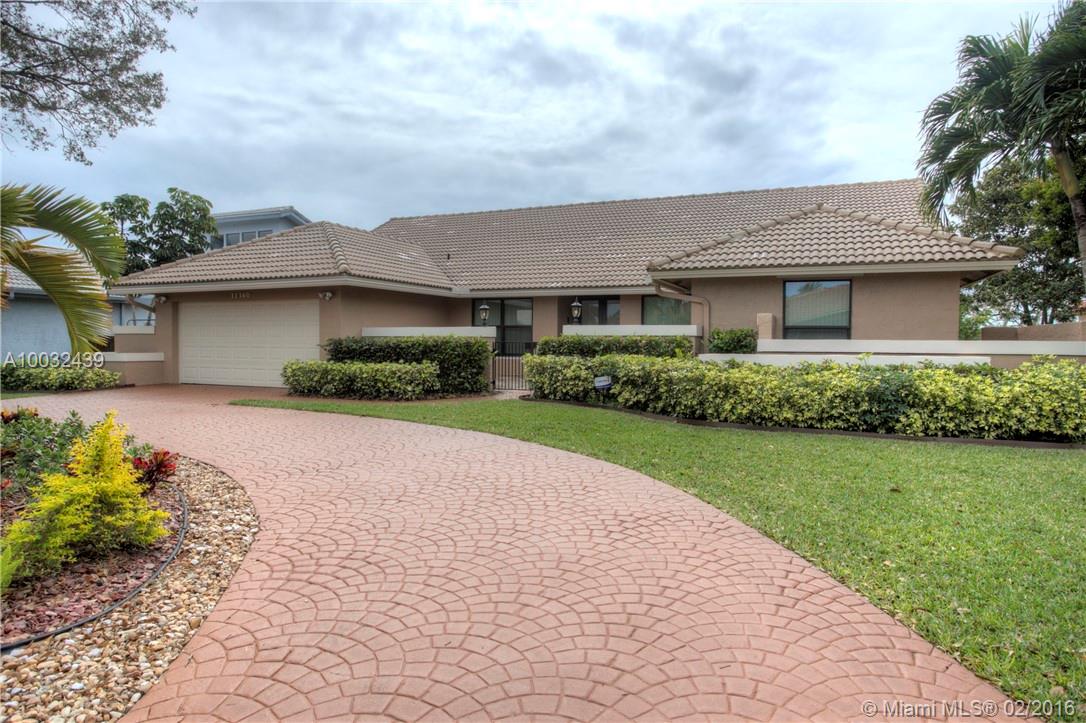 Rarely available, true 5 bedroom pool home nestled in a quiet community of other meticulously maintained homes. This is the home you've been searching for. Enjoy the spacious & bright, open concept floor plan; perfect for hosting events, relax in the sitting room off of the master bedroom, enjoy fishing from your private dock on the canal, the large grassy expanse in the back yard is perfect for playing a game of catch, watch the game and bbq on the back patio at the wet bar and take a dip in the pool.