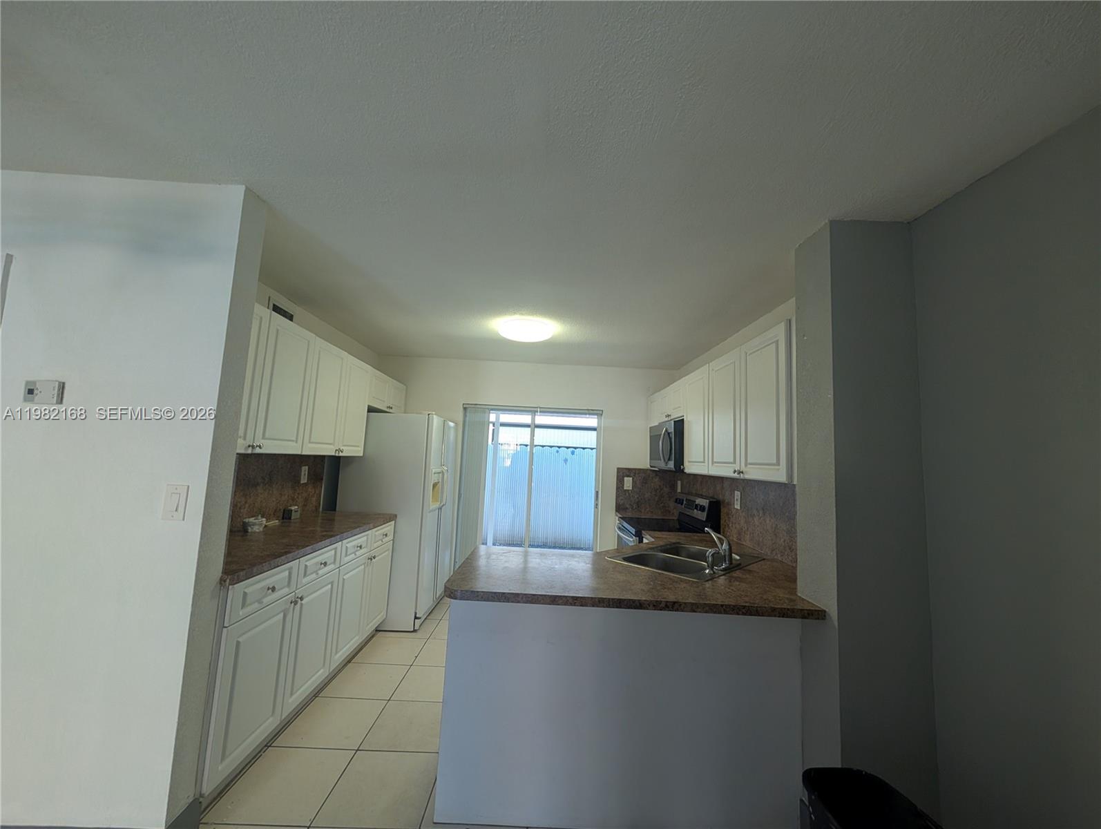 WEST PALM VILLAS III COND - Residential
