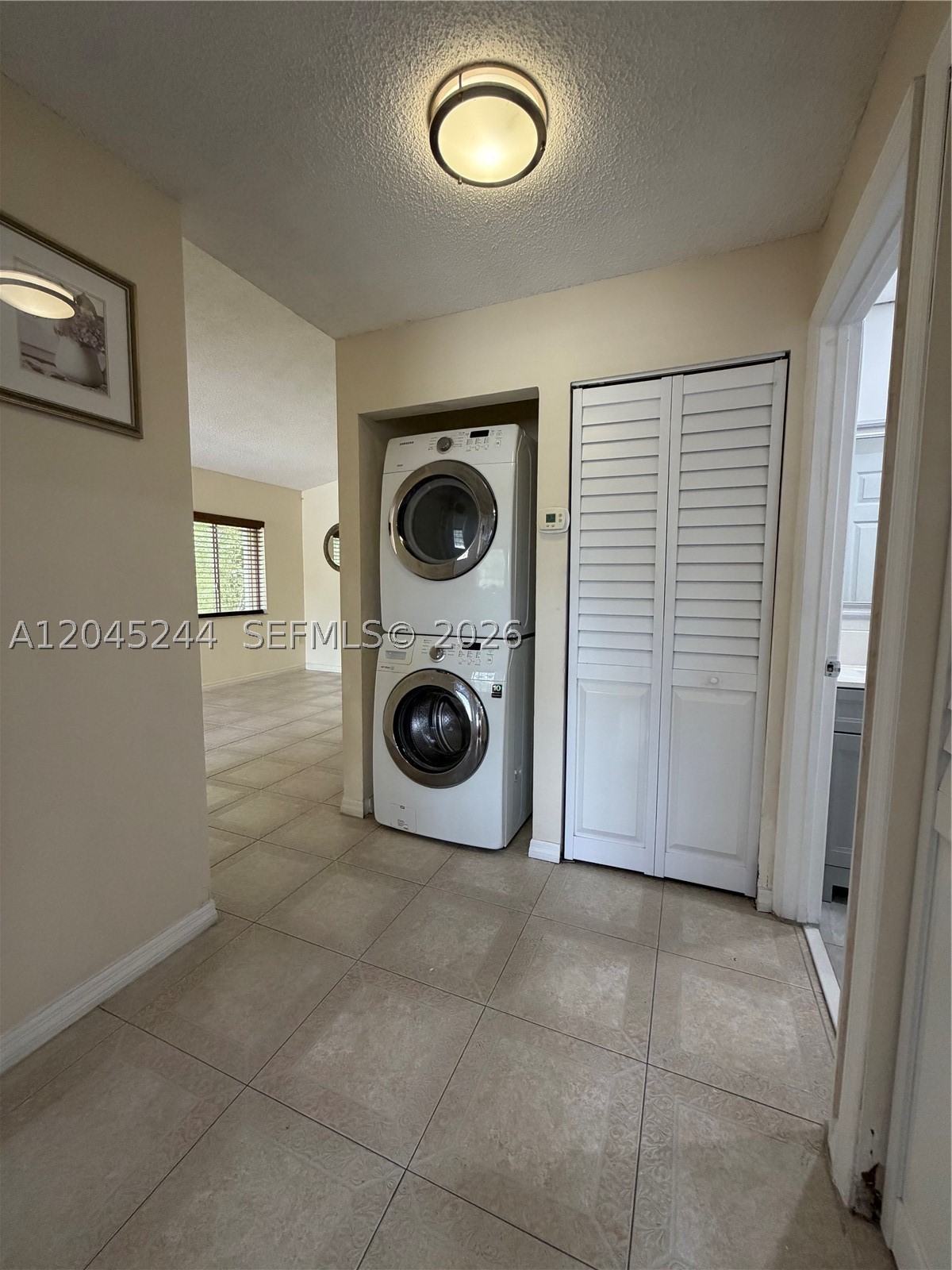 Beautifully maintained and spacious 3-bedroom, 2-bathroom corner unit with private second-floor entry. This bright and inviting condo features a functional split-bedroom floor plan, generous living and dining areas, and abundant natural light throughout. The primary suite offers a private bathroom and a spacious walk-in closet. Enjoy the convenience of an in-unit washer and dryer, along with 2 assigned parking spaces and ample guest parking. Located in the desirable Vista Alegre community, residents enjoy access to two community pools, a peaceful neighborhood, and quick access to the Florida Turnpike, shopping centers, restaurants, schools, and other everyday conveniences. A wonderful place to call home!