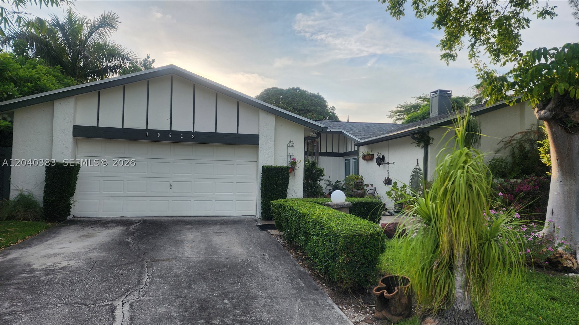 Looking for your forever home in a solid community on a cul-de-sac?  Huge pie-shaped lot of 16k sqft.  The important parts of the house have been done for you in 2024: roof, AC and impact windows & doors.  You can do the other updates to your taste, as the house really deserves it and so do you.  This is a classic split plan house, where the 2-car garage was turned into additional living space plus storage.  Nice vaulted ceilings in the living room, with lots of areas to spread out in.  The outside is a landscaper’s dream, with multiple plant types, fruit trees, 2 koi ponds and an aviary.  The pool enjoys afternoon sun and there is a covered terrace, as well. Fully fenced yard with gates on both sides of the house.  The Crossings gives you the opportunity to enjoy the amenities (pools, gym, clubhouse, basketball, tennis) , plus a place to store your boat at their secured community lot.
