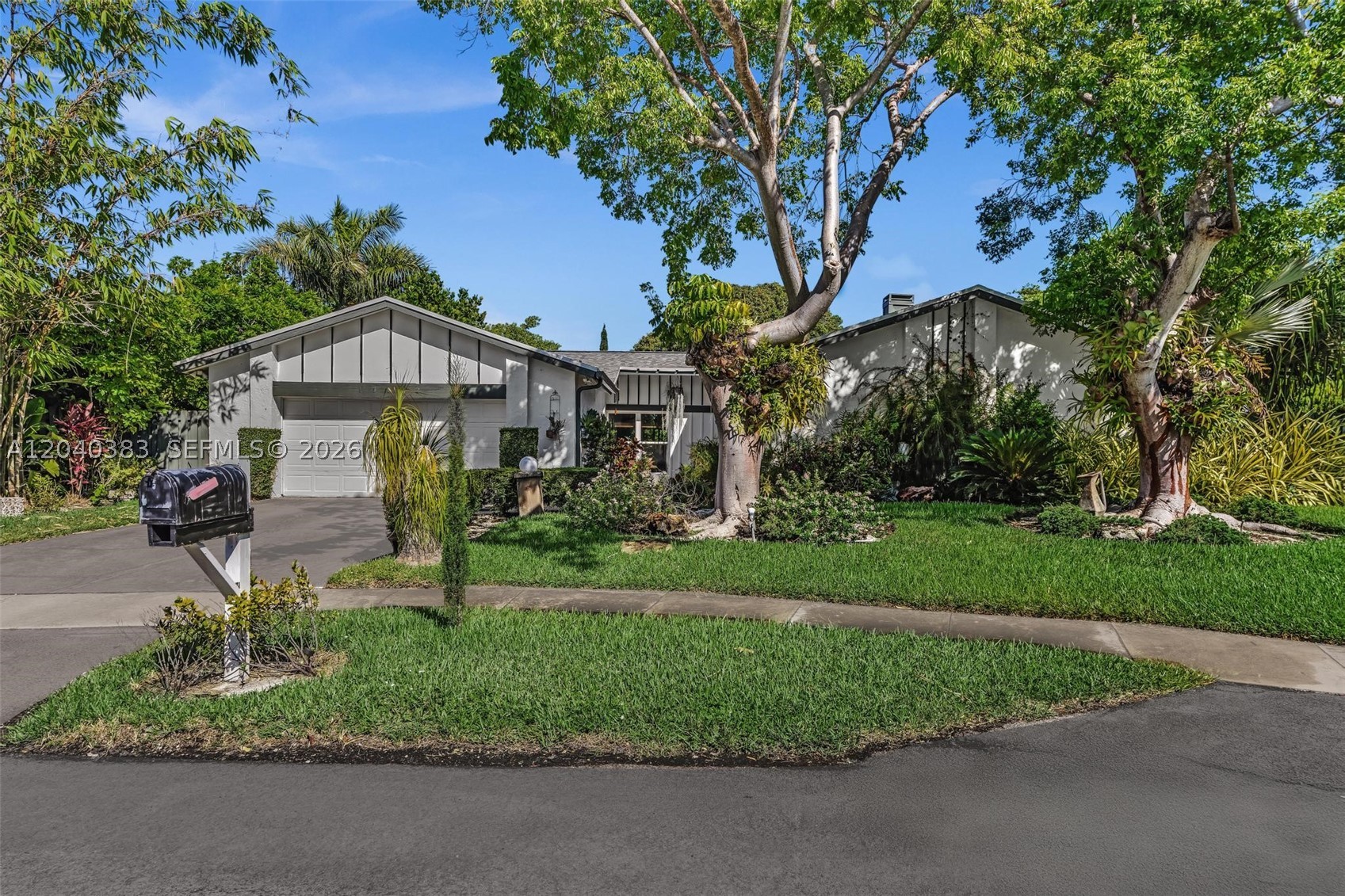 Looking for your forever home in a solid community on a cul-de-sac?  Huge pie-shaped lot of 16k sqft.  The important parts of the house have been done for you in 2024: roof, AC and impact windows & doors.  You can do the other updates to your taste, as the house really deserves it and so do you.  This is a classic split plan house, where the 2-car garage was turned into additional living space plus storage.  Nice vaulted ceilings in the living room, with lots of areas to spread out in.  The outside is a landscaper’s dream, with multiple plant types, fruit trees, 2 koi ponds and an aviary.  The pool enjoys afternoon sun and there is a covered terrace, as well. Fully fenced yard with gates on both sides of the house.  The Crossings gives you the opportunity to enjoy the amenities (pools, gym, clubhouse, basketball, tennis) , plus a place to store your boat at their secured community lot.