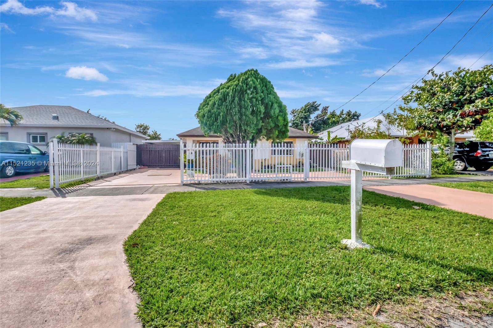 STOP LOOKING! YOU'VE FOUND YOUR NEW HOME WITH NO ASSOCIATION & NO FLOOD ZONE! Beautiful 4 Bedroom/2 Bathroom single-family home fully fenced in with gated driveway. Features include impact windows all around, complete appliances (refrigerator, stove, dishwasher, & microwave) in your comfortable kitchen, tile & laminate wood floors throughout, a spacious yard for family BBQs, and a shed for extra storage! You'll be glad to have the convenience of a washer and dryer inside the laundry room by the kitchen. Additionally, you'll enjoy a carport and plenty of parking for get-togethers and parties! Close to everything including great schools, shopping, hospitals, and expressways! Hurry, won't last! Call now! Watch Full 3D Video Walk-Thru in Virtual Tour!