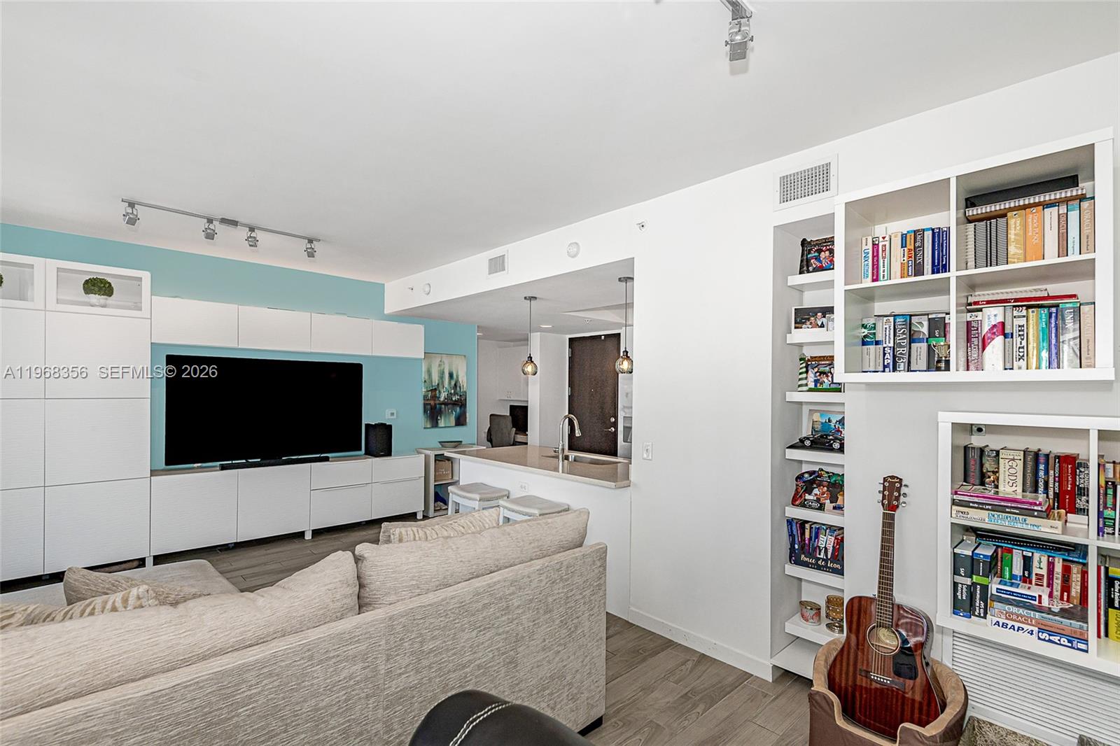 REDUCED - READY FOR OFFERS AND CONTRACTS - High floor, spacious turnkey furnished 1/1 at The Nine - the center of everything Brickell. Upgraded cabinetry throughout including custom designed entertainment center with fantastic storage, massive customized walk-in designer closet plus additional finishes and furnishings in every room.  This oversized 1/1 offers space plus style with a walk-in closet the size of most Brickell bedrooms.  High floor residence with private oversized balcony plus assigned self parking included.  Nine offers many well-appointed amenities including a gorgeous newly renovated pool, large well equipped Fitness Center, open use Library with printing services, glass enclosed Conference Room, spacious Club Room, multi-use Game Room, beautiful Children's playroom - Plus - Publix is literally right downstairs.  Shows beautifully - easy to schedule - Best center Brickell location with large interior and comparatively low carrying costs.