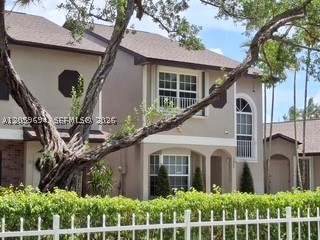 Come see this beautiful 3 bedroom 2.5 bath townhome in Colony Courts II, Sunrise. This lovely home features arched entryway, awesome renovated bathrooms, 2026 roof, large lake front patio, with outdoor storage.  Updated kitchen, wood and granite,  stainless appliances, window seat in kitchen, breakfast bar, wood look plank flooring, awesome renovated bathrooms, faux fireplace, security camera system. Primary suite with walk in closet, and so much more. Impact throughout.  Pet friendly  with community pool, low HOA fees, no Association approval required for purchase or rent. Close to shopping, Sawgrass Expressway, Florida Panthers Amerant Bank Arena, I595, and I75.  Easy to show.
