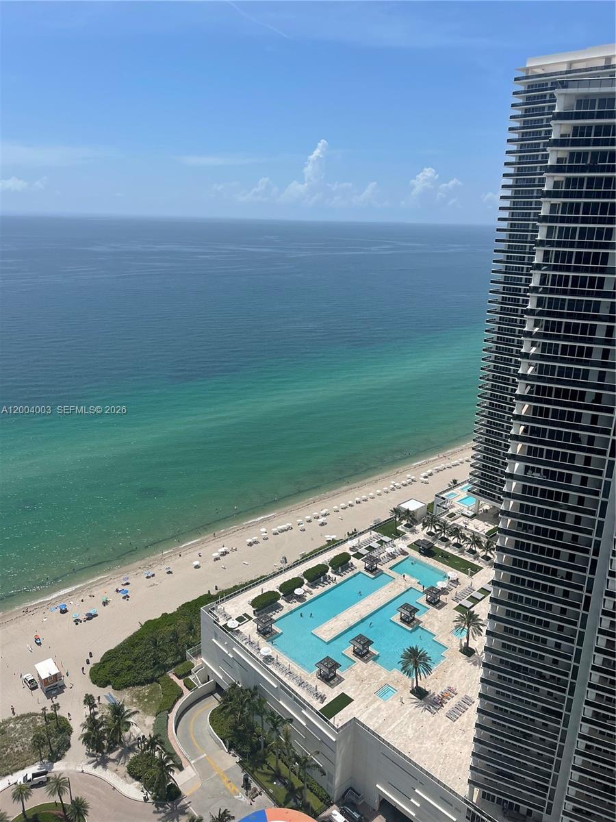 Best line in the building! Stunning high-floor residence offering breathtaking, unobstructed views of the ocean, Intracoastal, and the Miami & Ft. Lauderdale skylines. Ideally positioned just steps from the elevators at the prestigious LYFE Beach Resort, this unit features no rental restrictions—making it a perfect investment for Airbnb, short-term rentals, self-management, or enrollment in the hotel program.

Beautifully furnished and curated by Artefacto, the residence showcases high-end finishes, including Subzero and Bosch appliances, and includes the convenience of an in-unit washer and dryer. Designed for both luxury living and maximum income potential, the property boasts a proven track record with occupancy consistently exceeding 80%.

Enjoy world-class resort-style amenities such as two infinity-edge pools, expansive sundeck with private cabanas, on-site restaurants, a state-of-the-art fitness center, spa, and 24-hour concierge and front desk services. Prime location with direct beach access, and just minutes from top dining, shopping, supermarkets, casinos, and the renowned Gulfstream Park.

A rare opportunity to own a true income-producing gem in one of the most desirable beachfront resorts—must see!