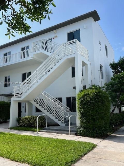 Beautiful modern condo in Landmark at Doral. This 3 bedroom 2 bathroom unit has an open area with kitchen, living and dining perfect for entertaining. The modern kitchen features a deluxe stainless steel appliance package and quartz countertop. Walk in closets and master bathroom with dual sink and large shower are very spacious. The home is equipped with the most up to date technology, Wi-Fi ready and keyless entry. The community offers resort style amenities, with tennis courts, pool, and gym. Near great schools, restaurants and entertainment spots.