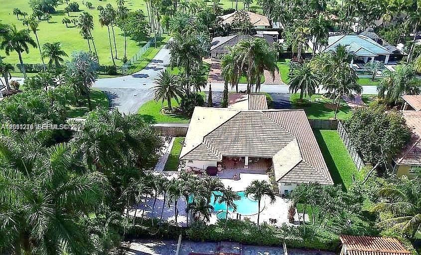 BEAUTIFUL CORNER 4BD/3BA HOME! LOCATED IN ONE OF MIAMI’S BEST AREAS. SURROUNDED BY BEAUTIFUL TOP LUXURY HOMES. PROPERTY COMES WITH A LARGE PORTE COCHERE. HAS (3,822 Sqft.) TOTAL AREA! UPDATED KITCHEN, GRANITE COUNTERTOP ISLAND AND SS/APPLIANCES! LARGE LIVING AND DINNING ROOM. OPEN FLOOR PLAN FOR ENTERTAINMENT/GATHERINGS. VALUME CEILINGS. TILED FLOORS THROUGHOUT. SURVEILLANCE CAMERAS ALARM SYSTEM. AMAZING LARGE BACKYARD. POOL & JACUZZI. LARGE GATES ON THE SIDES OF PROPERTY THAT IS PERFECT FOR BOATS, RV’S CAMPER TRAILER & WORK TRAILER. IN THIS QUIET NEIGHBORHOOD ALSO FEATURES PLENTY OF NEARBY SHOPPING CENTRE, RESTAURANTS, SUPERMARKETS, GYM, MOVIE THEATERS AND A+ SCHOOLS. A MUST SEE TO APPRECIATE.
