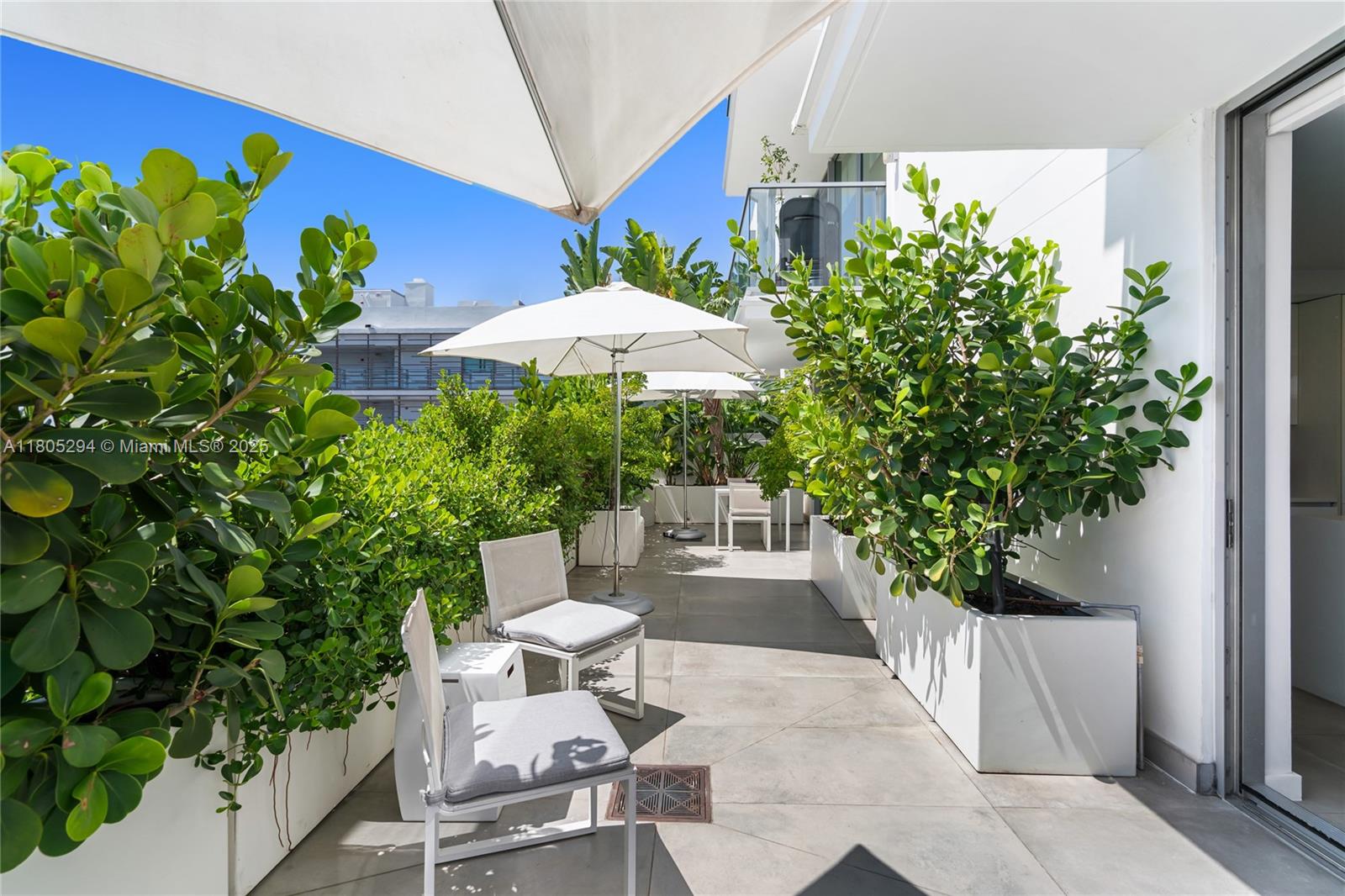 Experience elevated living at its finest in this exquisite condo in Miami Beach, FL. This boutique residence offers a perfect blend of luxury and comfort, with 1,334 SqFt of thoughtfully designed space. Featuring 2 spacious bed & 2.5 baths. The layout is ideal for both relaxation & entertaining. Step into a beautifully appointed interior that exudes sophistication & style. The open-concept living area is designed to maximize space and functionality, creating an inviting atmosphere for residents & guests alike. 10 Ft kitchen island, 500 SqFt terrace w/ custom planters & irrigation system, custom doors, motorized shades and porcelain tiles. Enjoy a suite of premium amenities that extend your living space with a heated pool & much more.Furniture is negotiable.