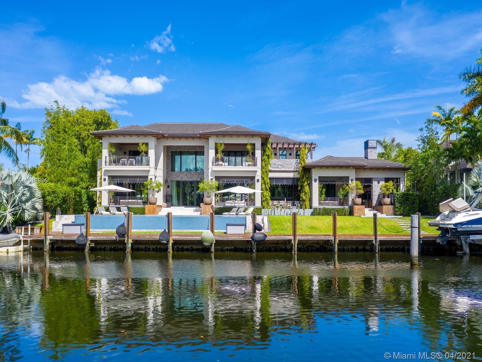 Dream CLASSIC CONTEMPORARY WATERFRONT home in the exclusive GATED Community of Old Cutler Bay in CORAL GABLES.This stunning 11,112 SF Total home lies on a 22,400 SF Lot,w/140 Ft of waterfrontage,100 ft dock w/no bridges to bay,offering 7 beds+possible 8th&8.5 baths.Featuring the ideal outdoor entertaining areas,Grillworks Argentinian Parilla, outdoor dining rm+an Infinity pool.This home radiates elegance w/a double height foyer leading you to the formal living & dining room.State of the art kitchen by Mia Cucina,Subzero&Wolf appliances+a Bertazzoni gas stove w/double ovens,informal dinning room. 2nd flr offers expansive master suite+3 ensuite guest beds+a family room w/full bath. 1st flr offers 2 add'l ensuite guest rooms, fully equipped 3 car garage, elevator, laundry room, staff quarters