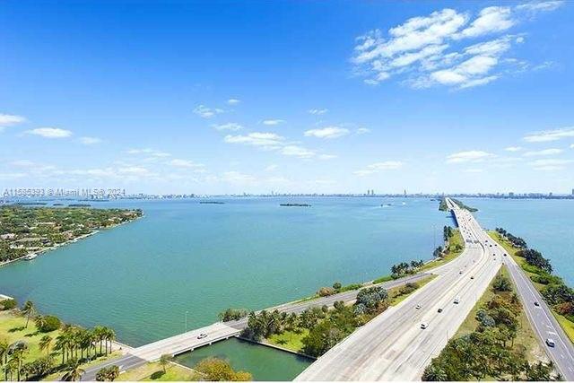 Spacious and bright unit with with wonderful. Limitless bay views. New floor just installed throught the unit. Floor to ceiling impact windows in living area and Master Bedroom. Convenient location with direct access to Miami Beach, Miami Airport, Design District, Midtown and Brickell.
Unit is Vacant and easy to show, Please call/text listing Agent. See broker remarks.